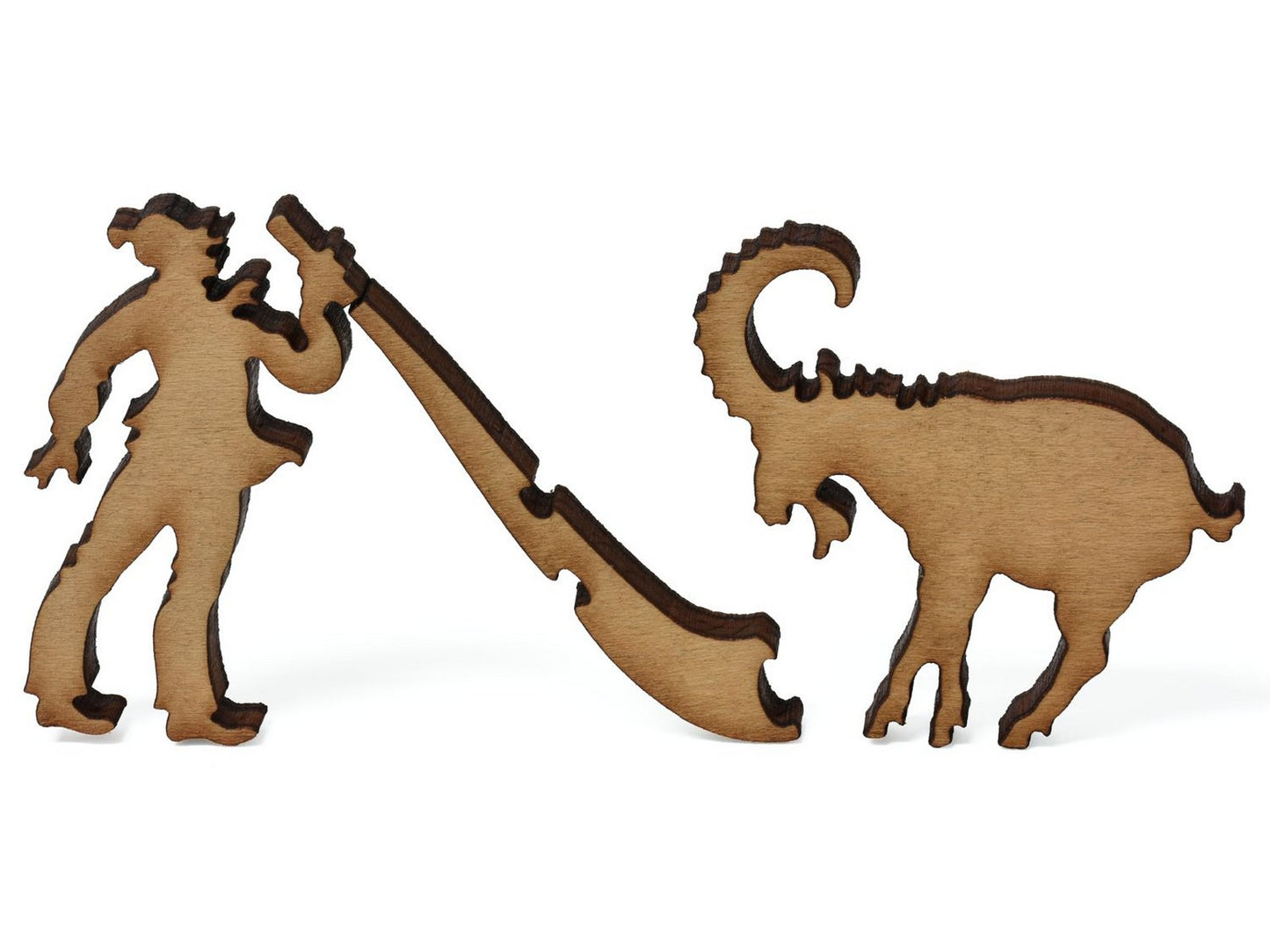 A closeup of pieces showing a person blowing an alpenhorn and a mountain goat.