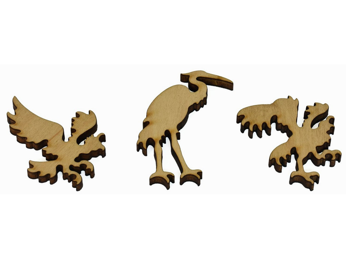 A closeup of pieces showing three birds.