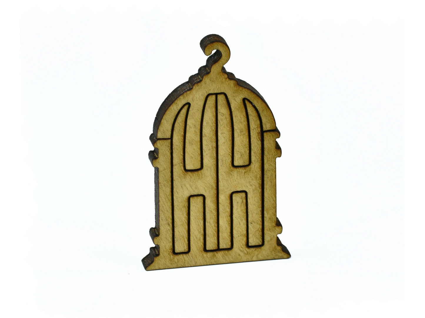 A closeup of pieces in the shape of a birdcage.