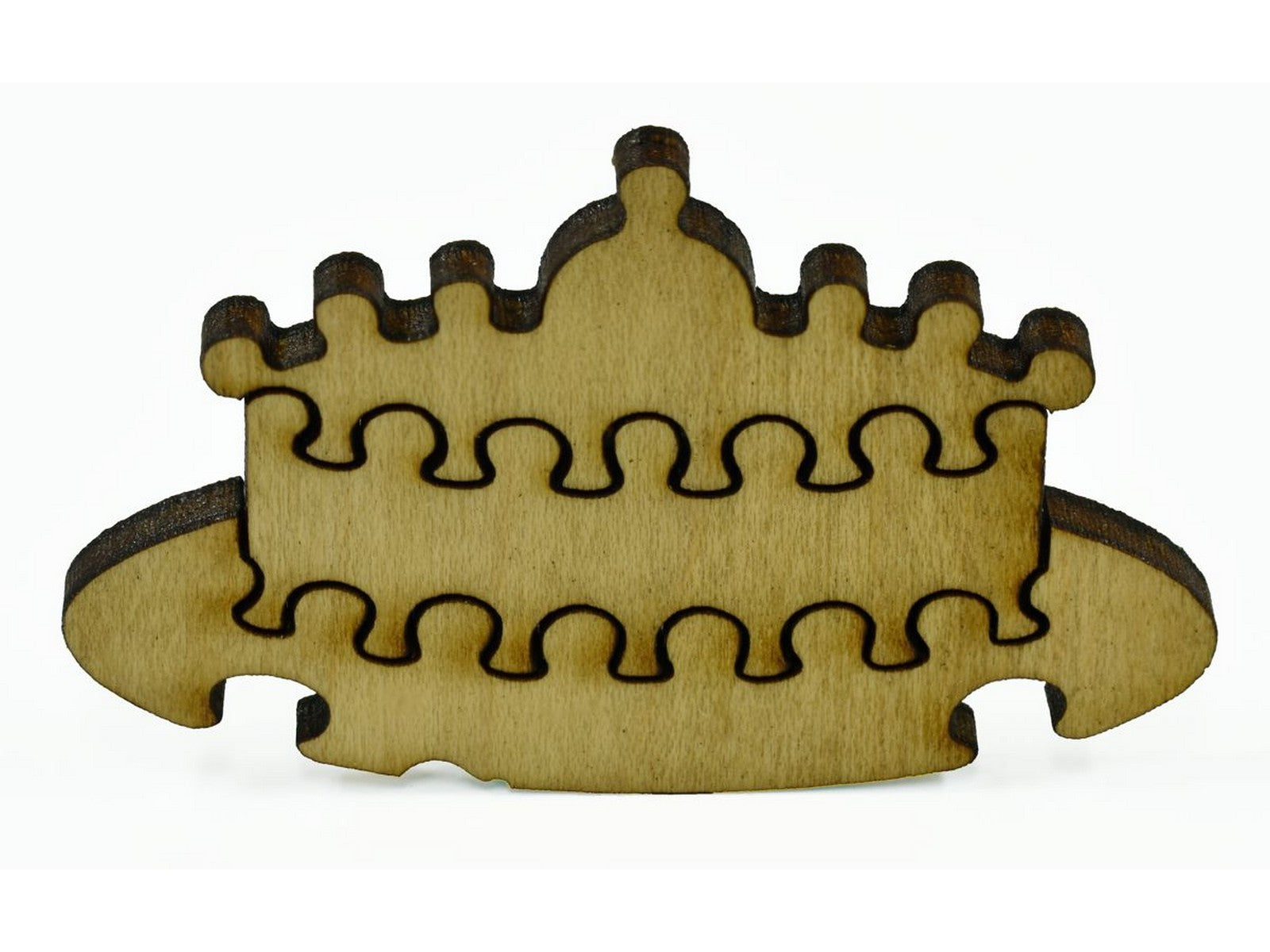 A closeup of pieces that show a decorated cake.