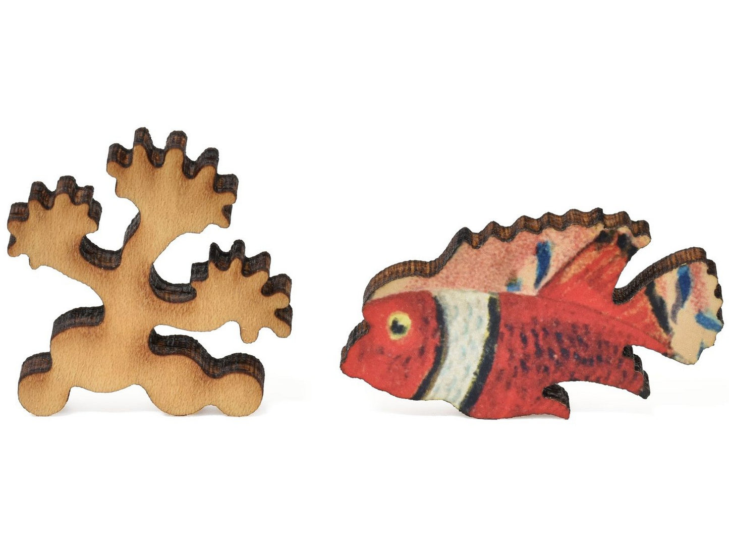 A closeup of pieces showing a clownfish and coral.