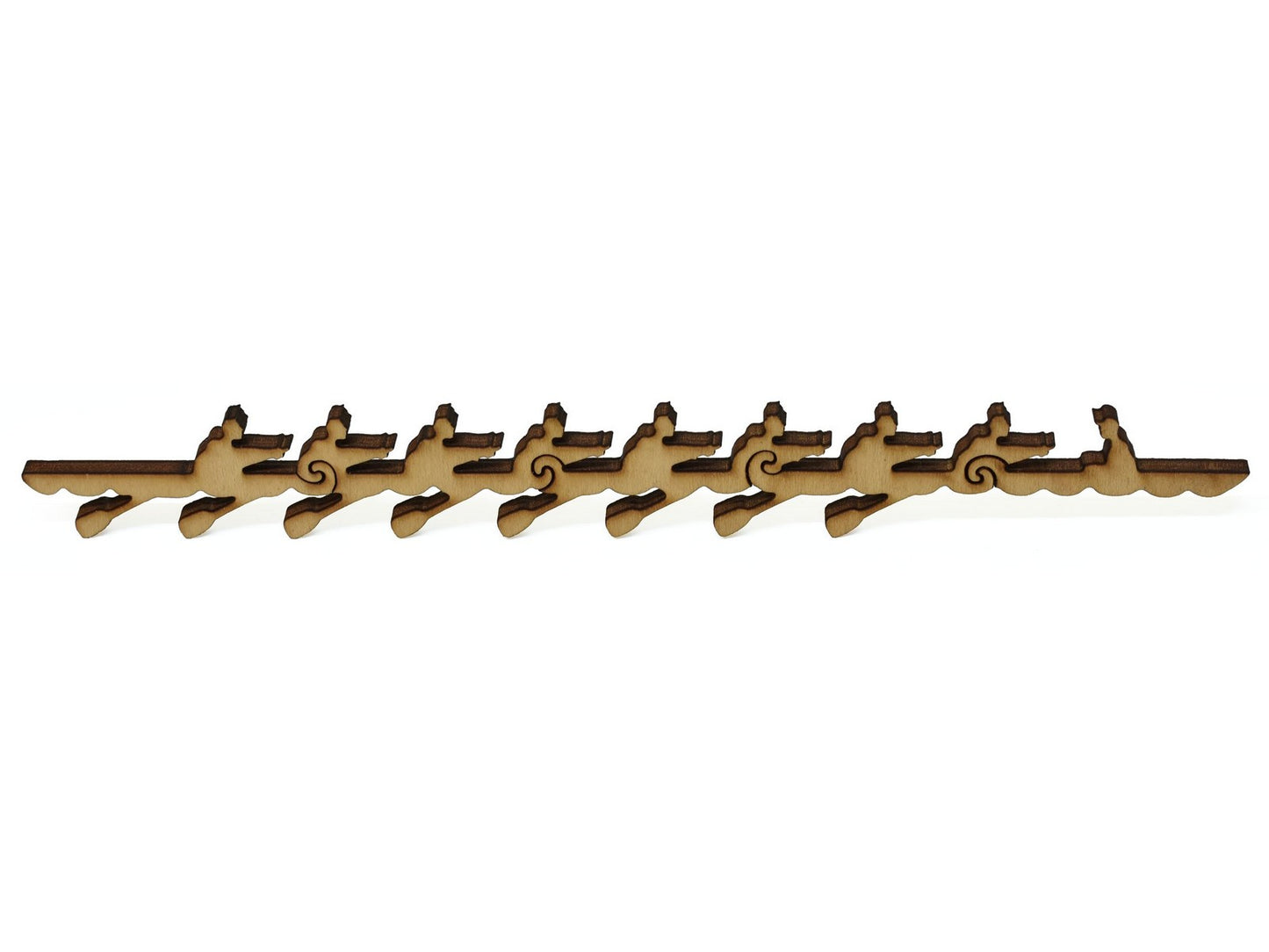 A closeup of pieces showing a crew of rowers in their boat.