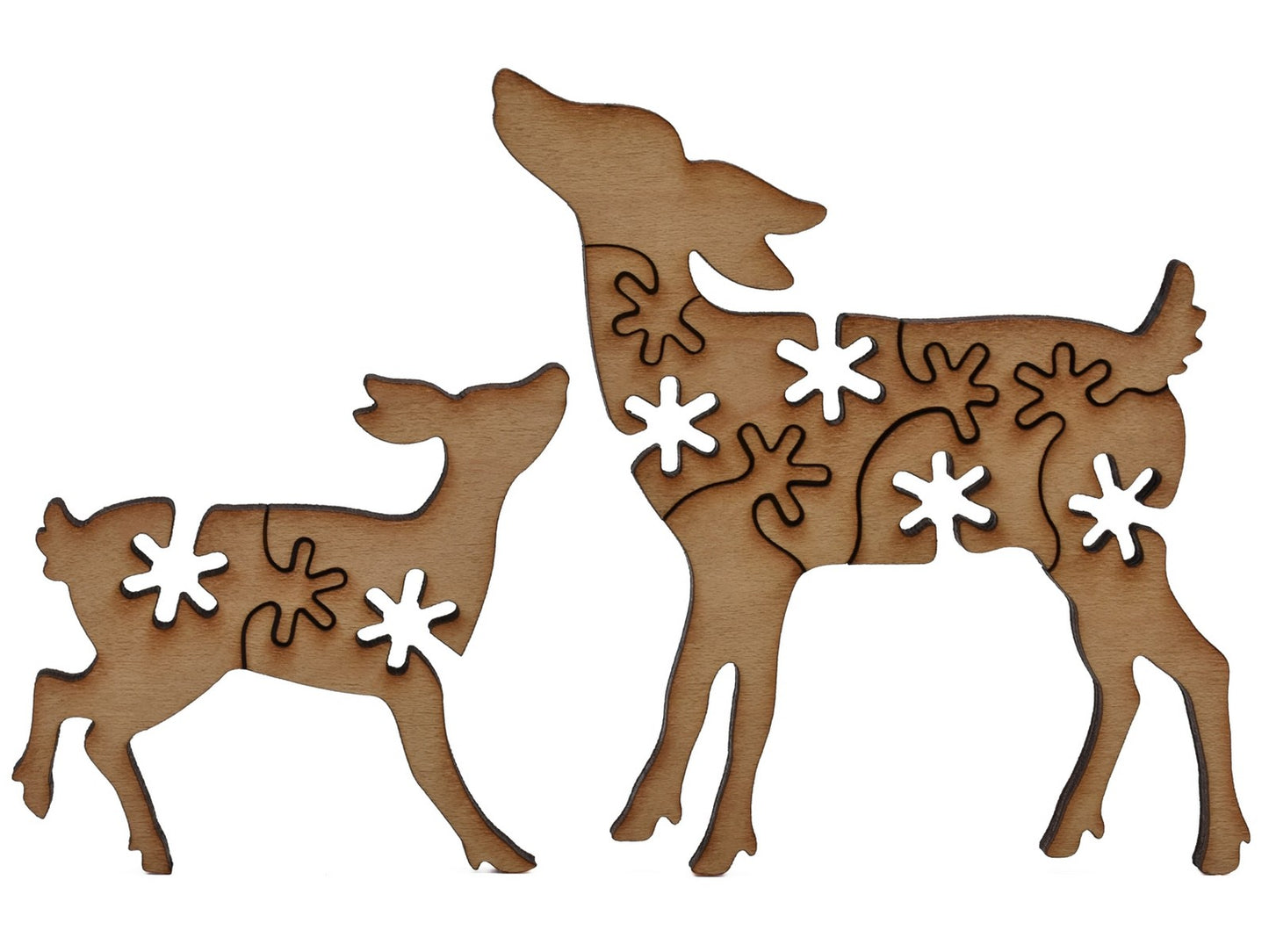 A closeup of pieces shaped like a doe and its fawn.