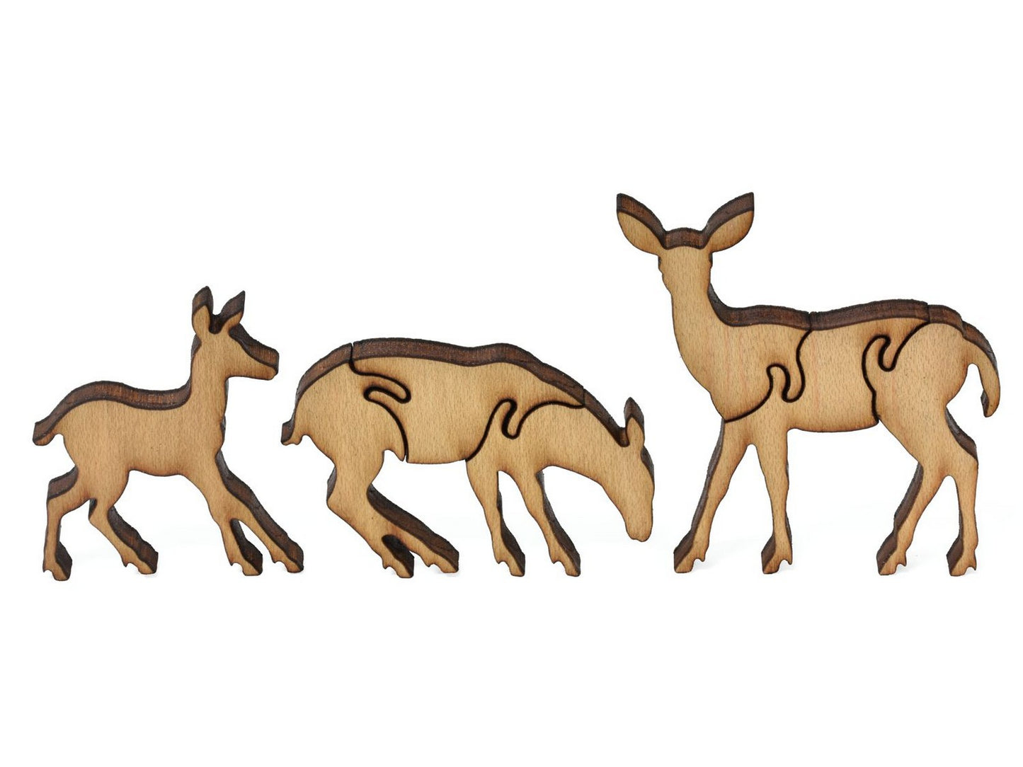 A closeup of pieces showing three deer.