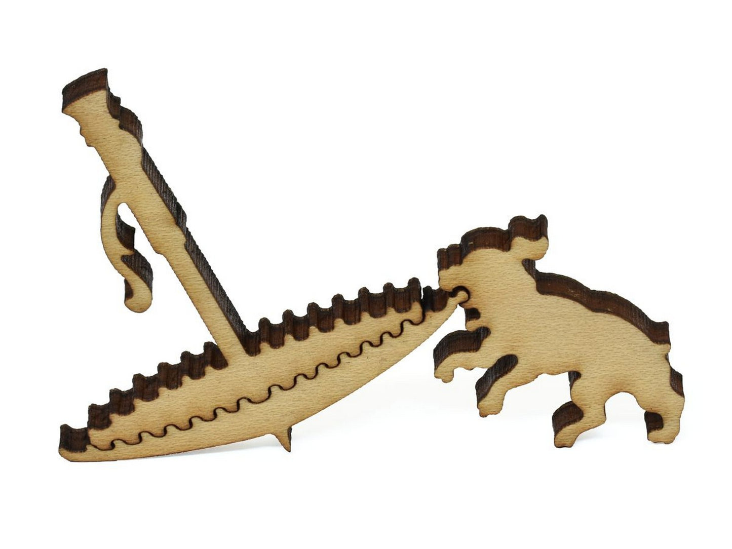 A closeup of pieces showing a puppy dragging an umbrella.