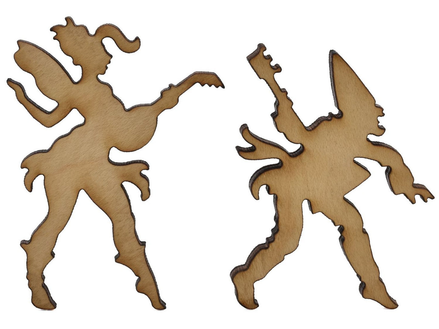 A closeup of pieces shaped like two fairies playing instruments.