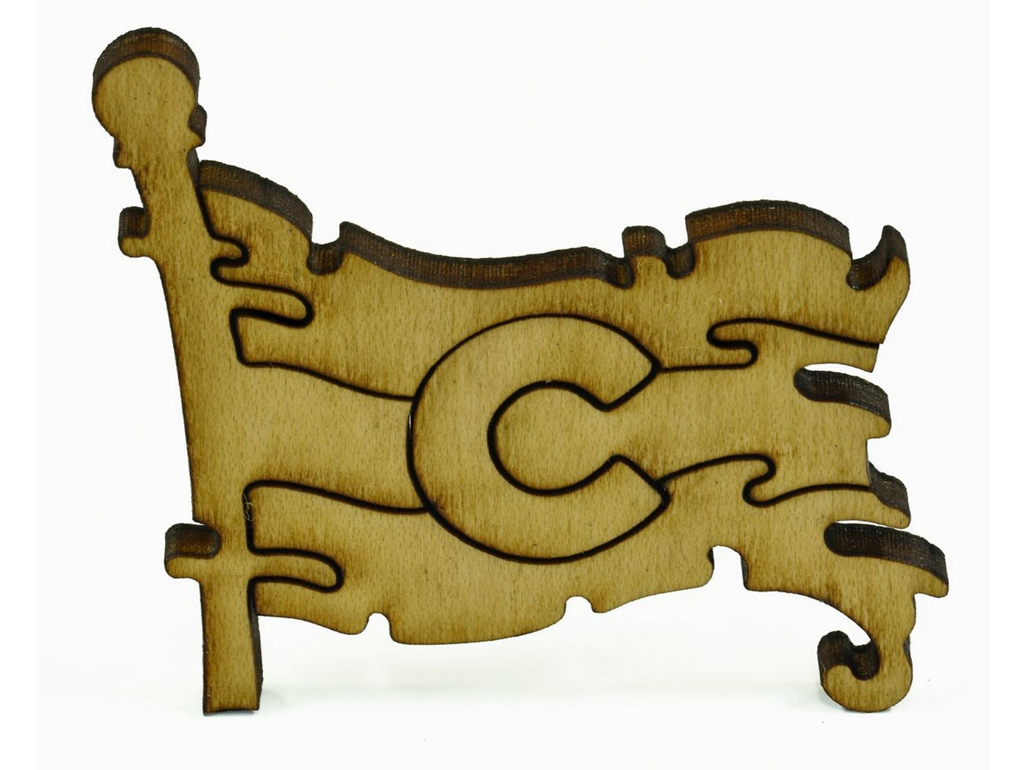 A closeup of pieces in the shape of a colorado flag.