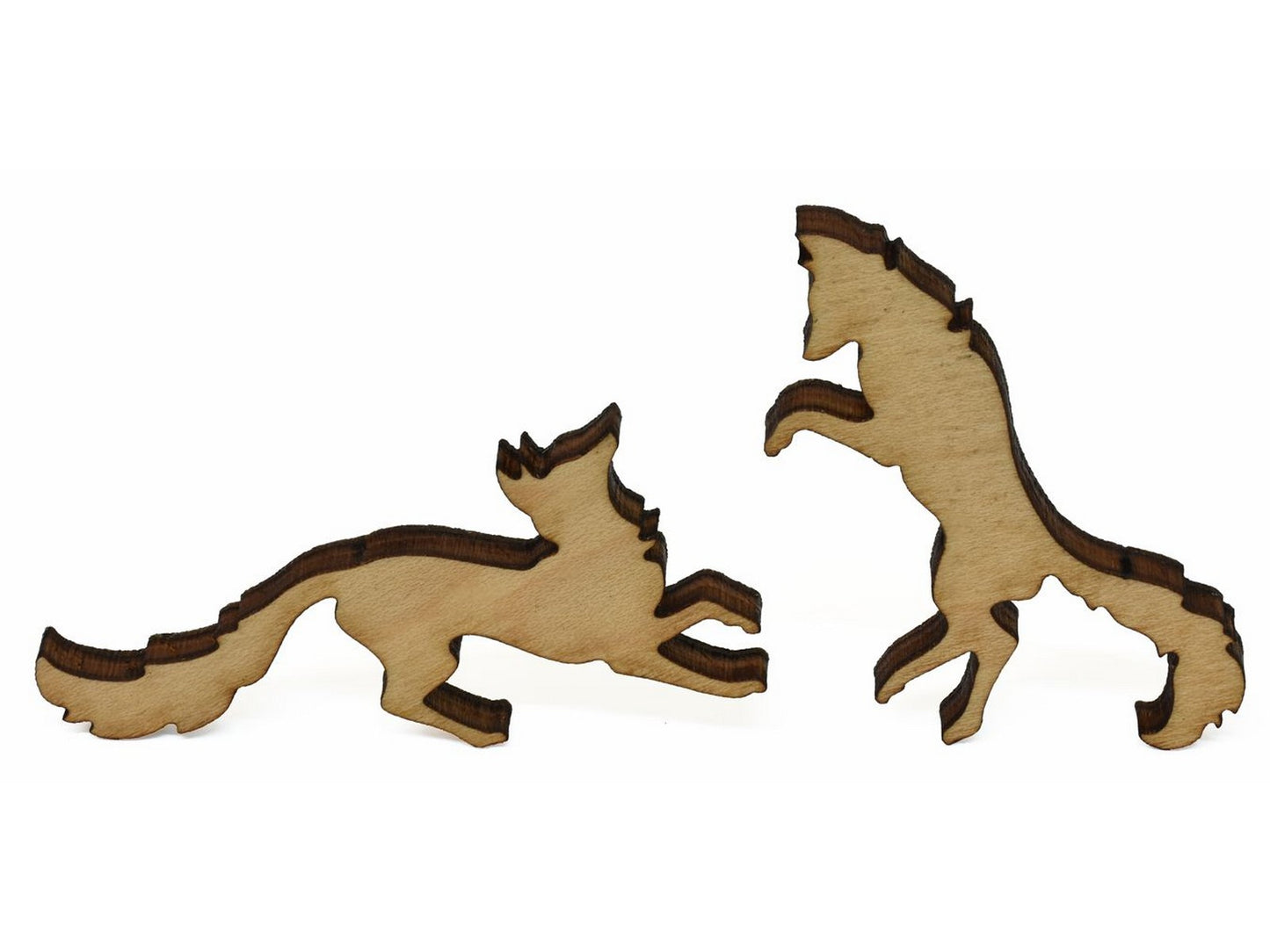 A closeup of pieces showing two foxes playing.