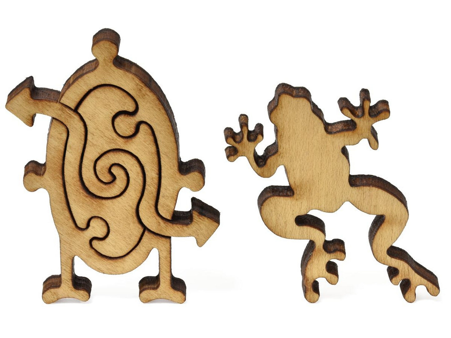 A closeup of pieces showing a mirror and a frog.