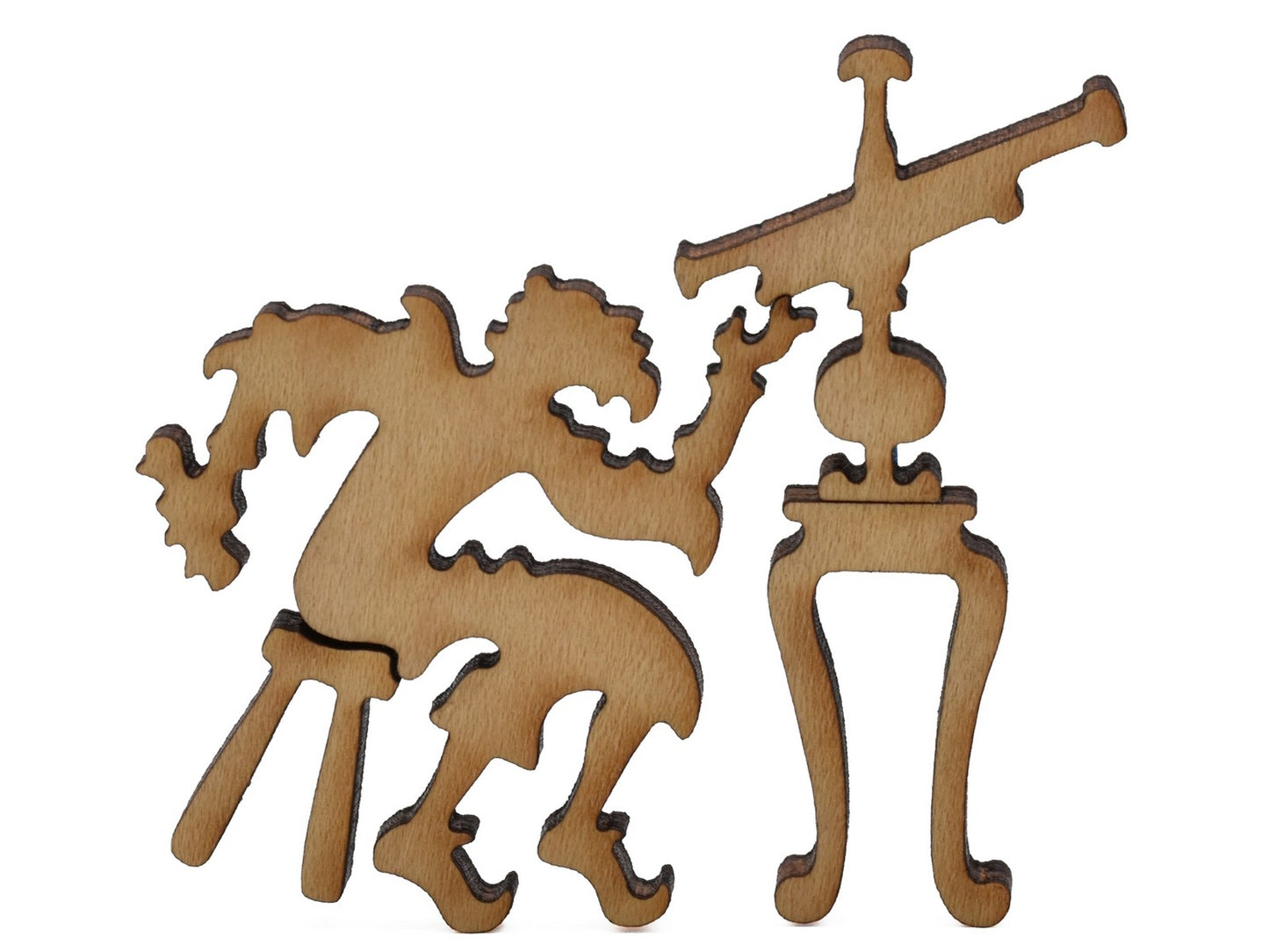 A closeup of pieces shaped like Galileo and a telescope.