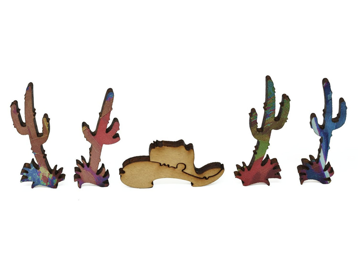 A closeup of pieces showing a cowboy hat and cacti.