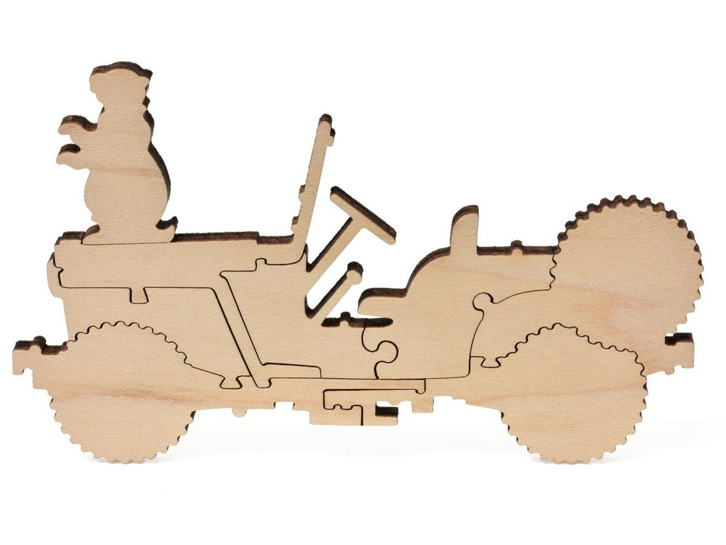 A closeup of pieces showing a marmot sitting on a car from the puzzle, Gothic, Colorado.