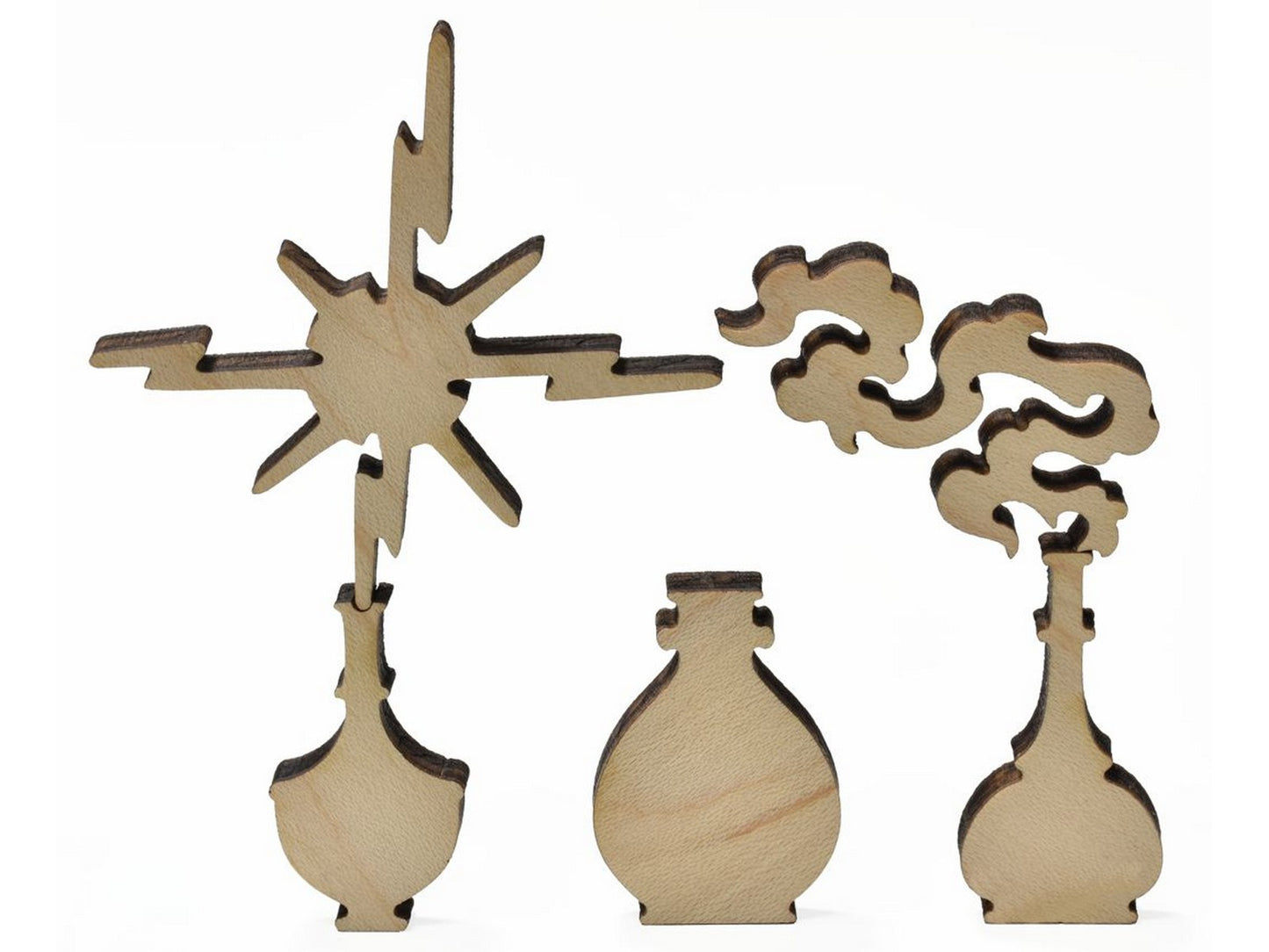 A closeup of pieces showing three lamps.