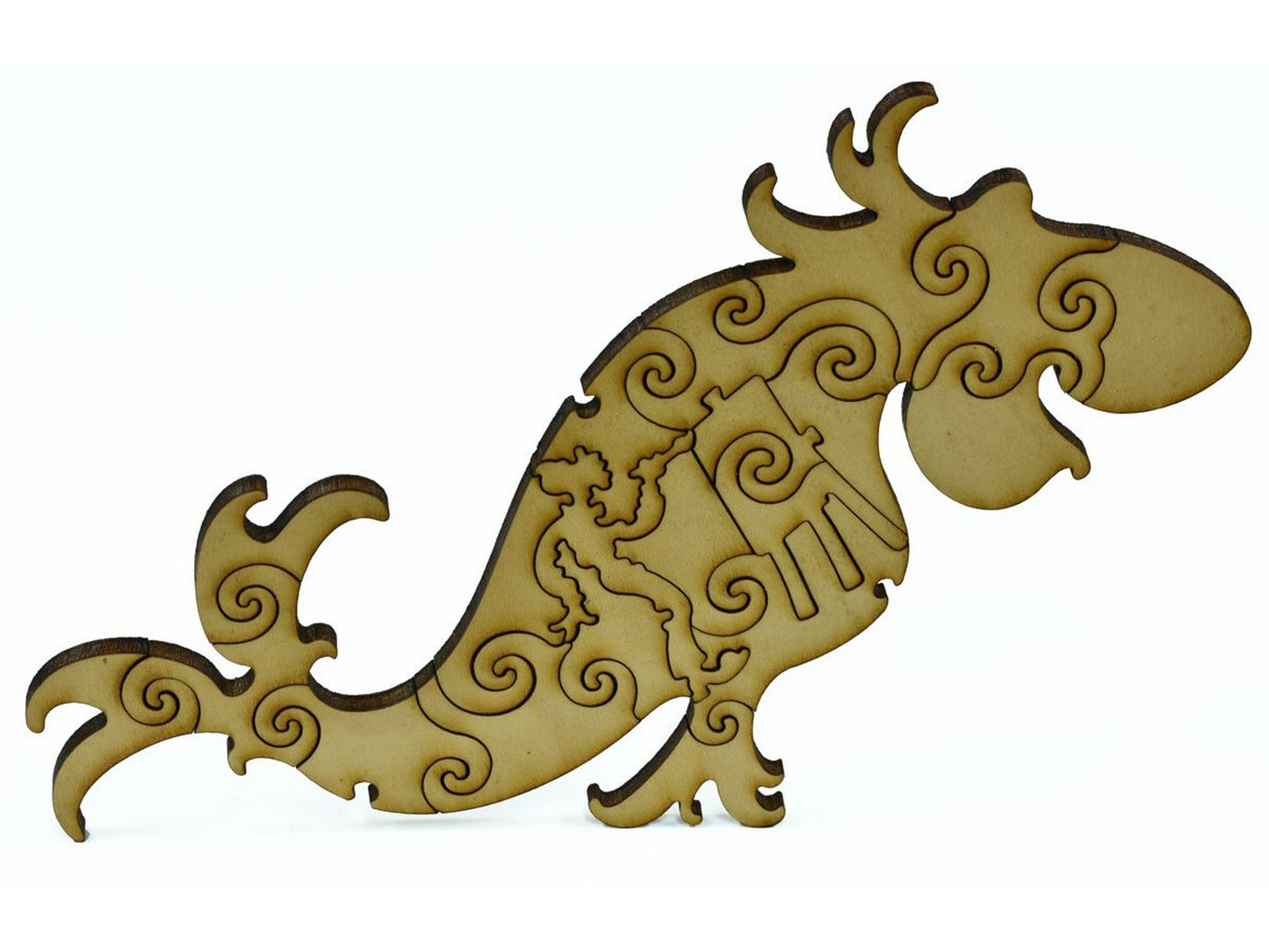A closeup of pieces in the shape of a large fish with a painter inside of it.