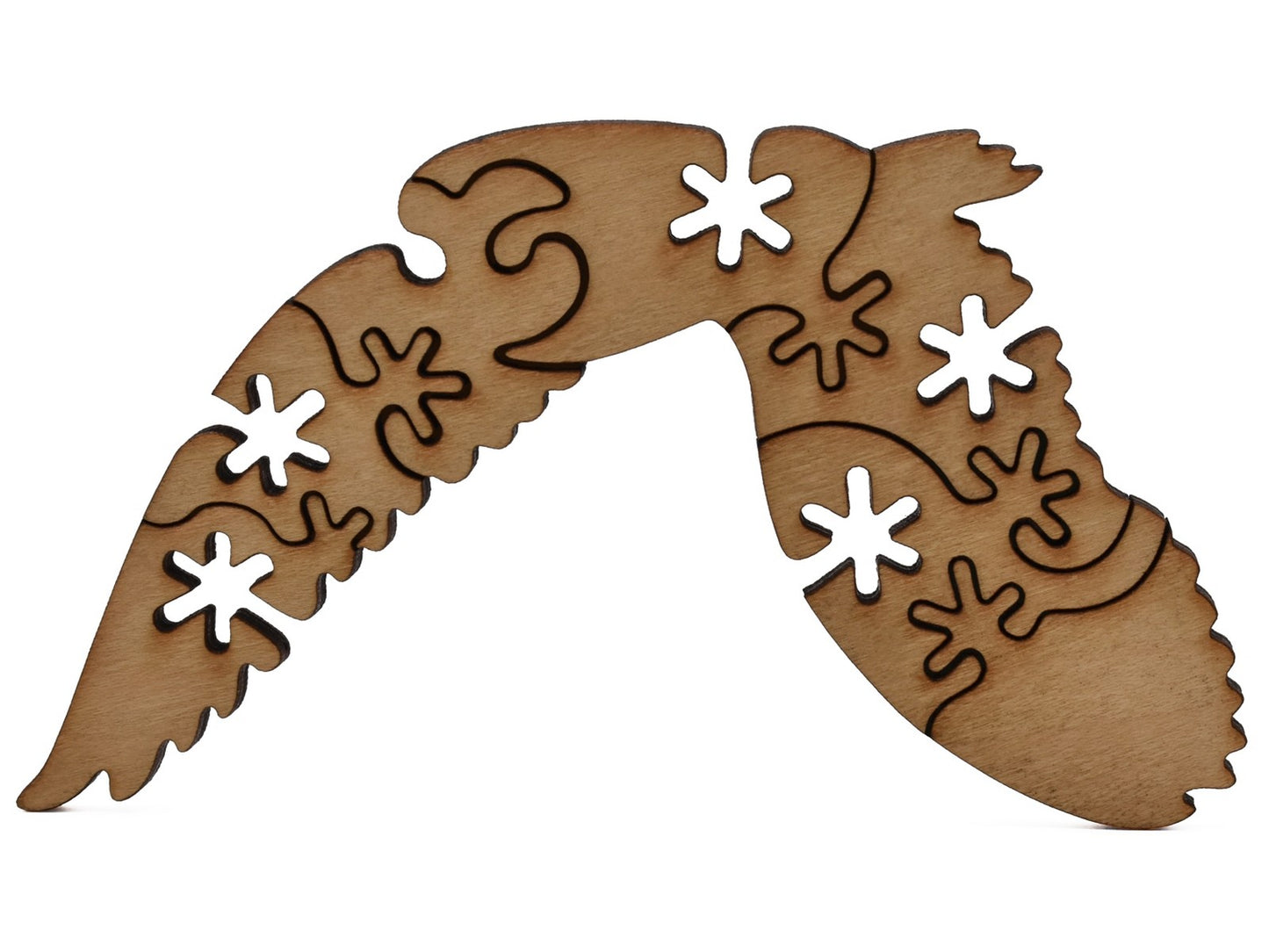 A closeup of pieces shaped like a large owl.