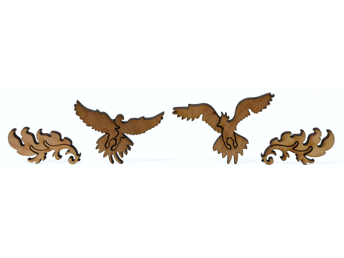 A closeup of pieces showing two birds and feathers.