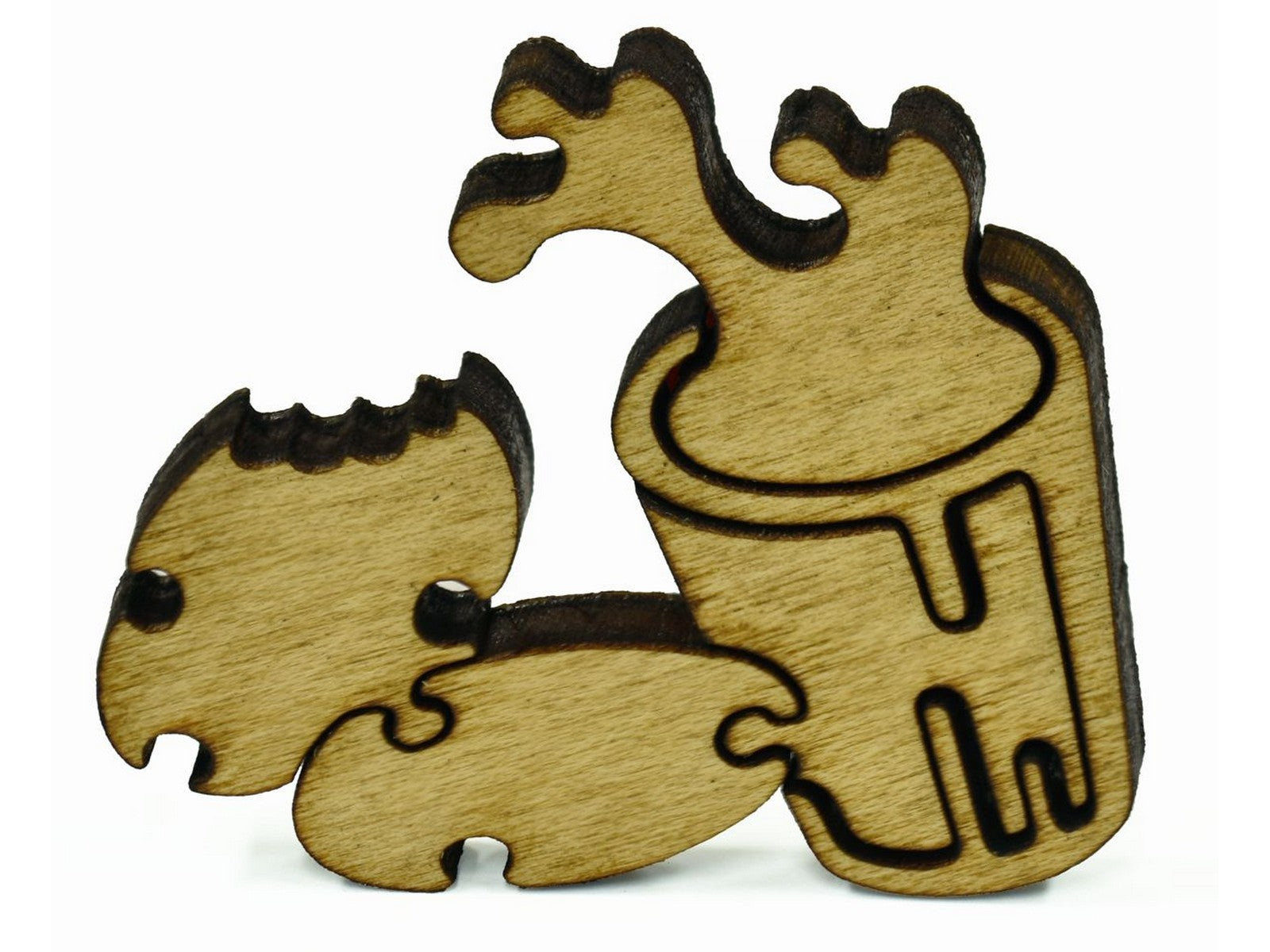 A closeup of pieces in the shape of cookies and milk.