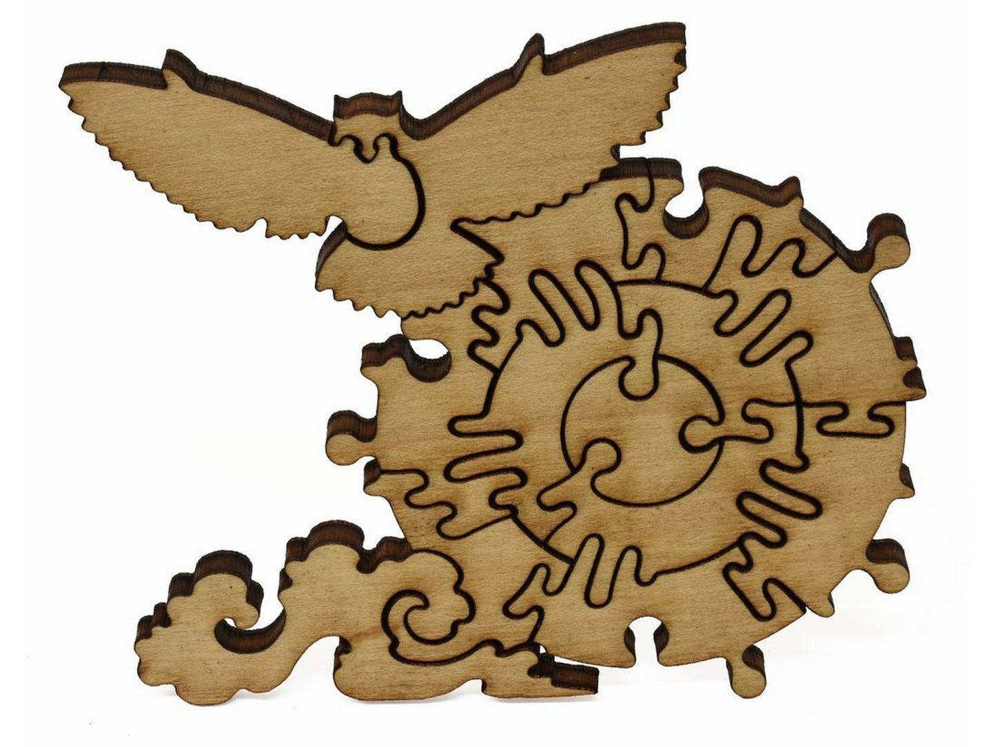 A closeup of pieces showing an owl flying across the moon.
