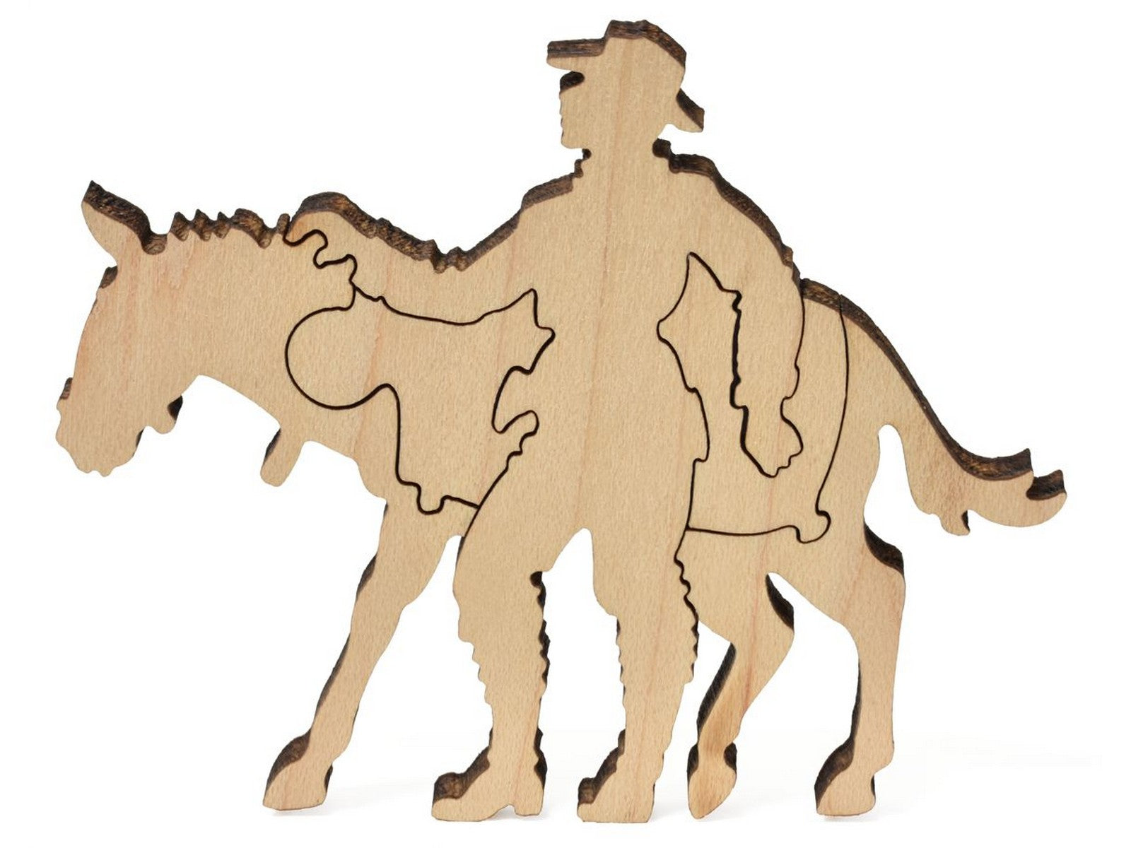 A closeup of pieces showing a man with a pack mule from the puzzle, Gothic, Colorado.