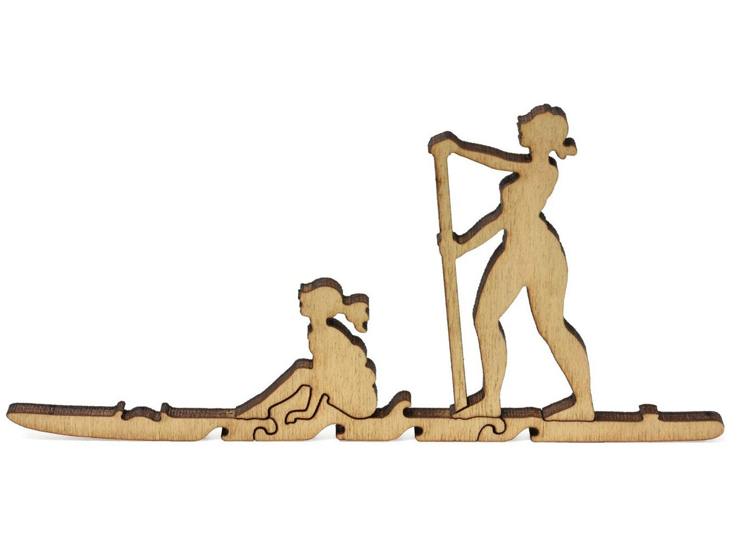 A closeup of pieces that shows two people on a paddleboard.
