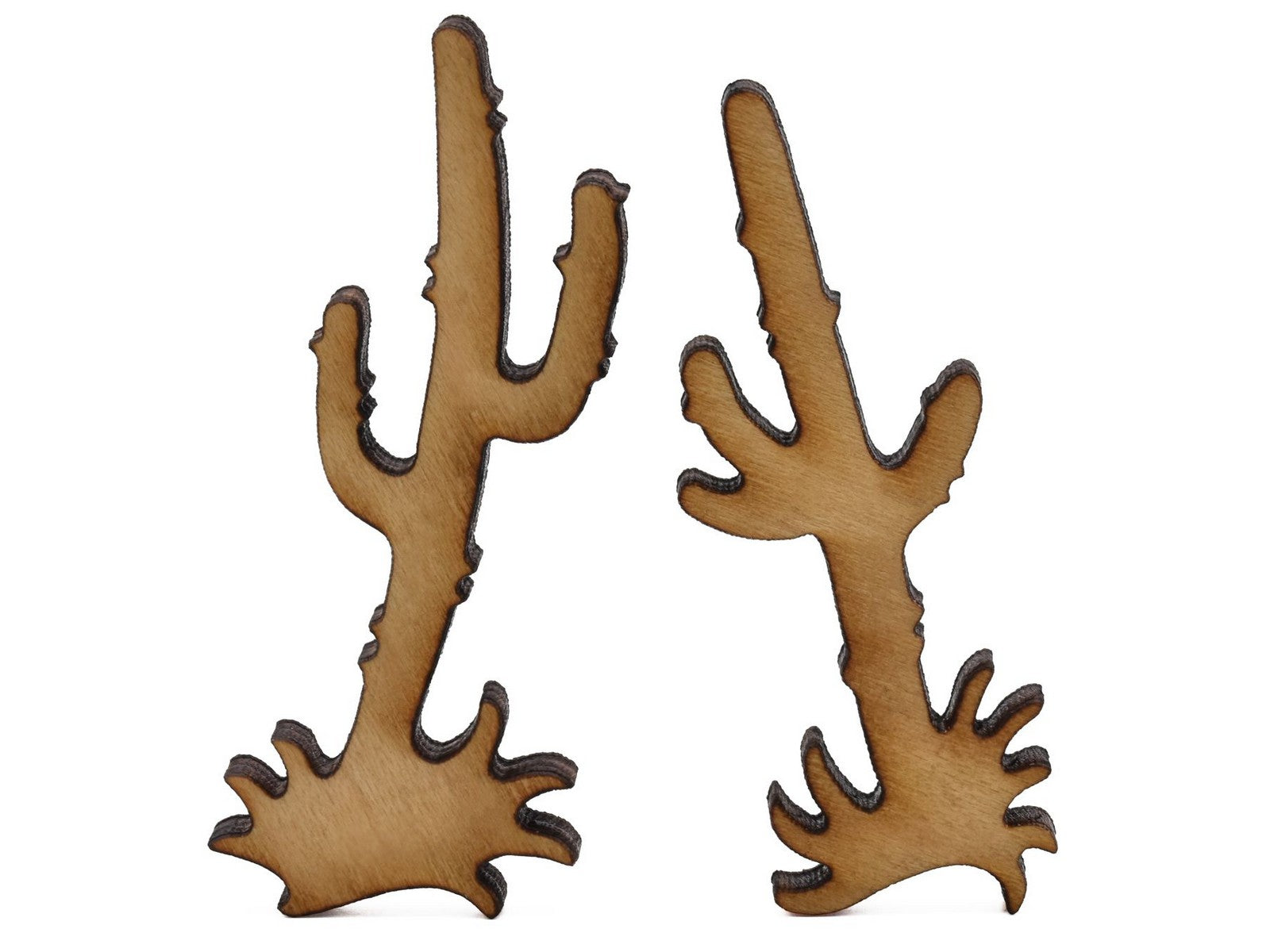 A closeup of pieces shaped like two cacti.