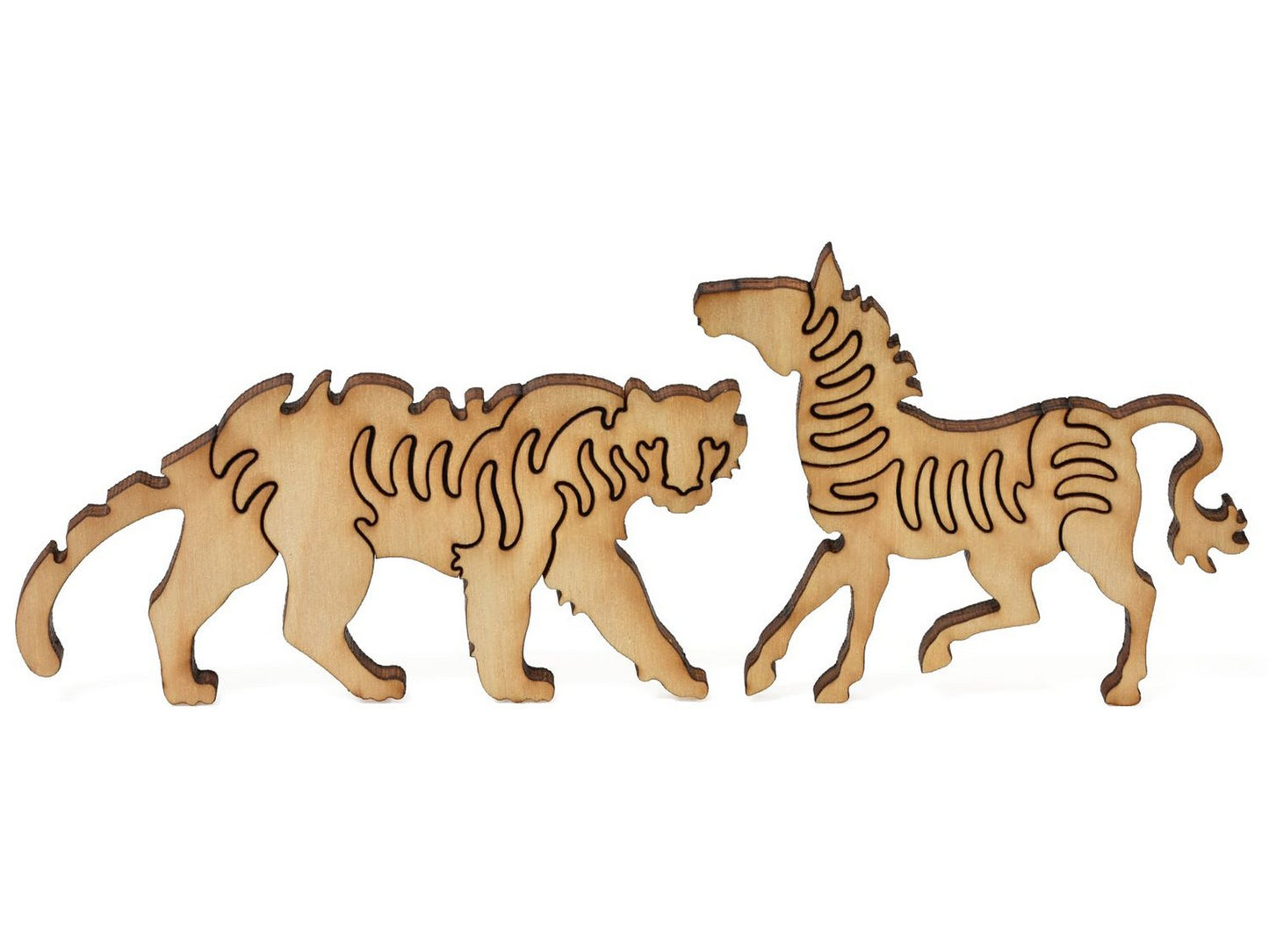 A closeup of pieces showing a tiger and a zebra.