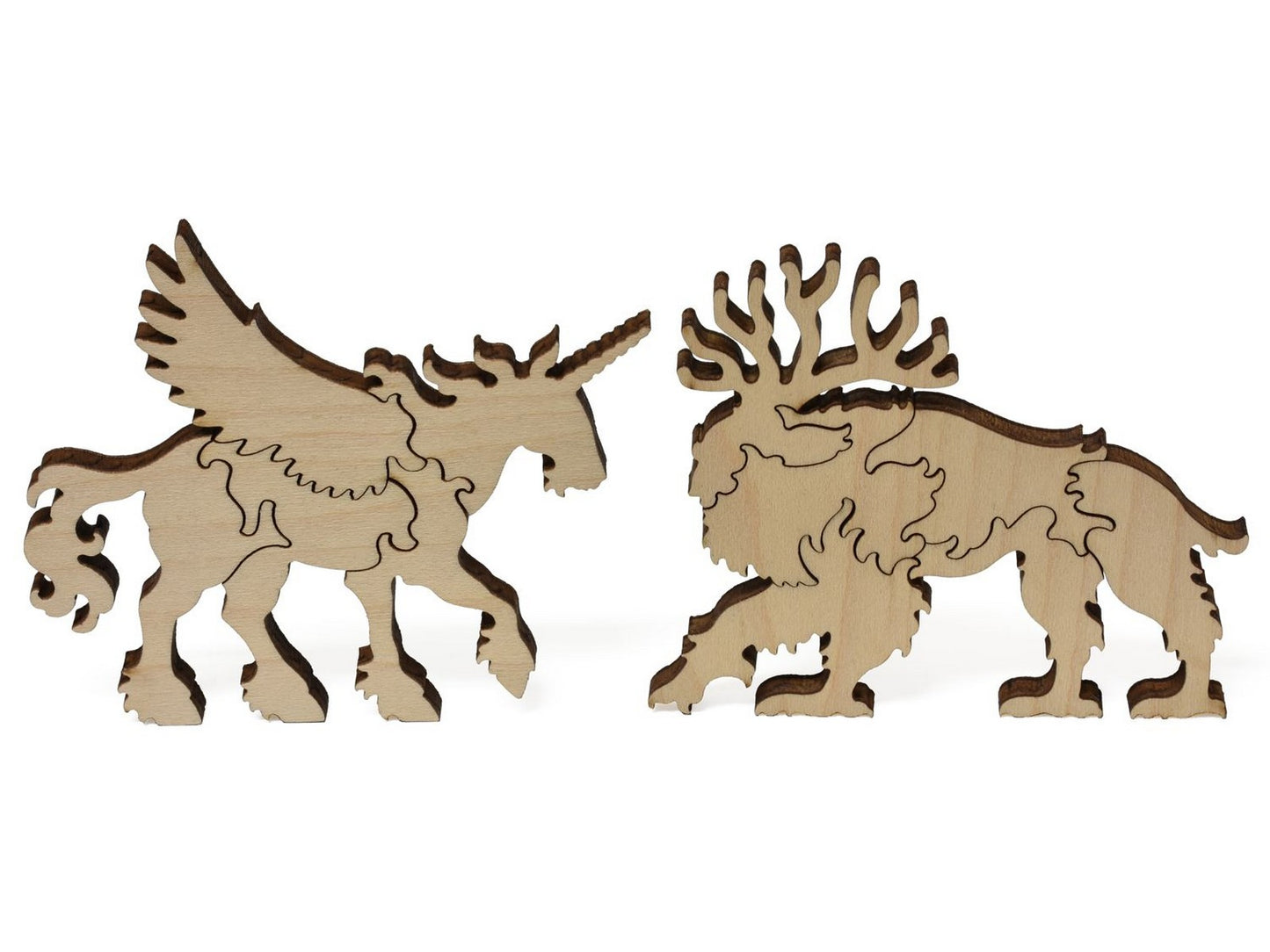 A closeup of pieces showing a pegasus and a creature from Canoe of Fate.