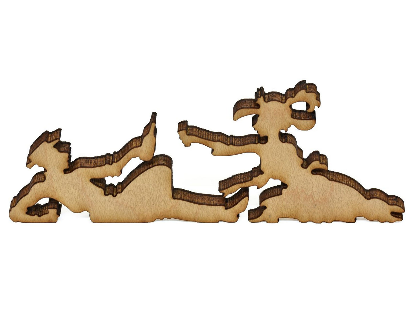 A closeup of pieces showing two people having a picnic.