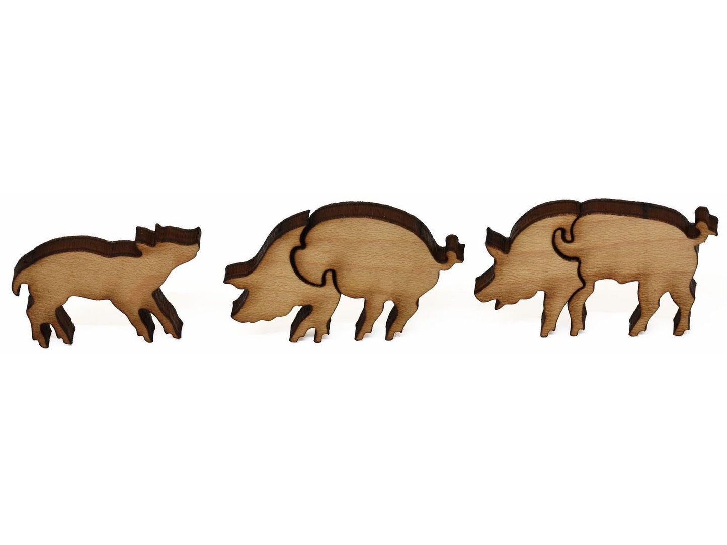 A closeup of pieces showing two pigs and a piglet.