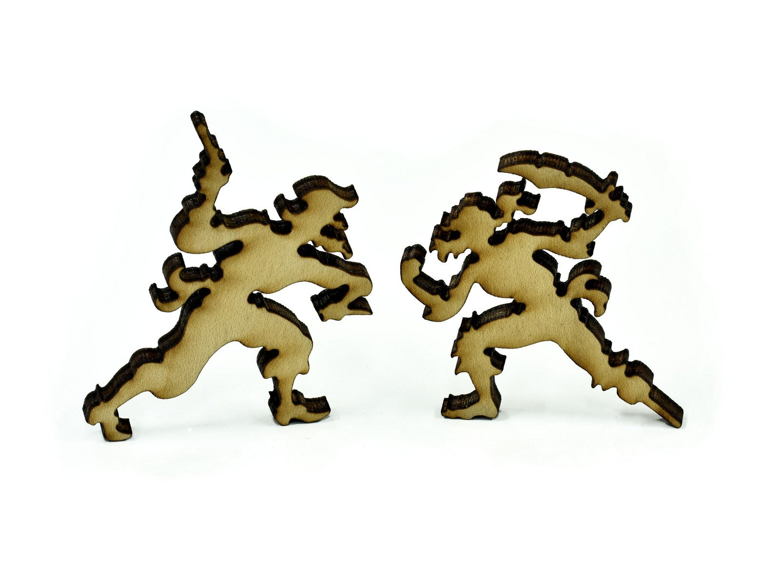 A closeup of pieces in the shape of two pirates.