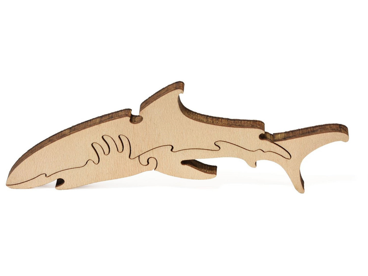 A closeup of pieces that show a shark from Monet's Sailboat at Le Petit Gennevilliers.