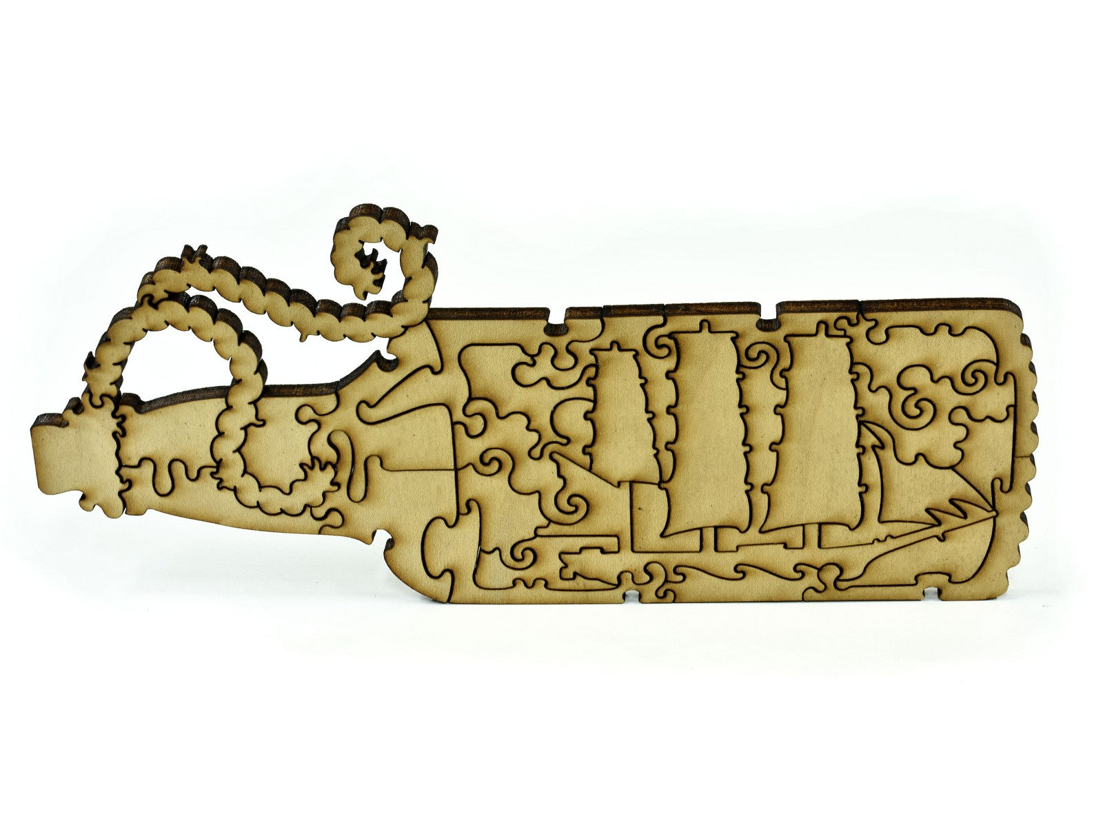 A closeup of pieces in the shape of a ship in a bottle.