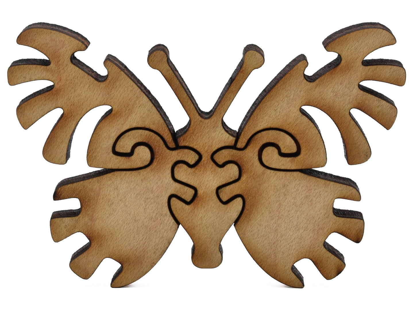 A closeup of pieces shaped like a third large butterfly.