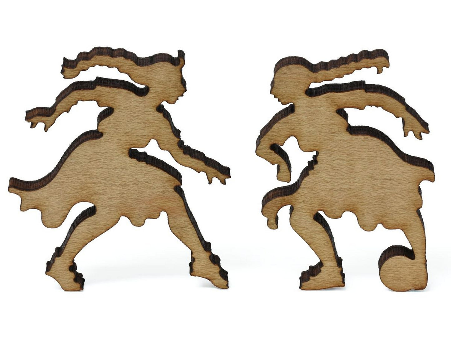 A closeup of pieces showing two children playing soccer.