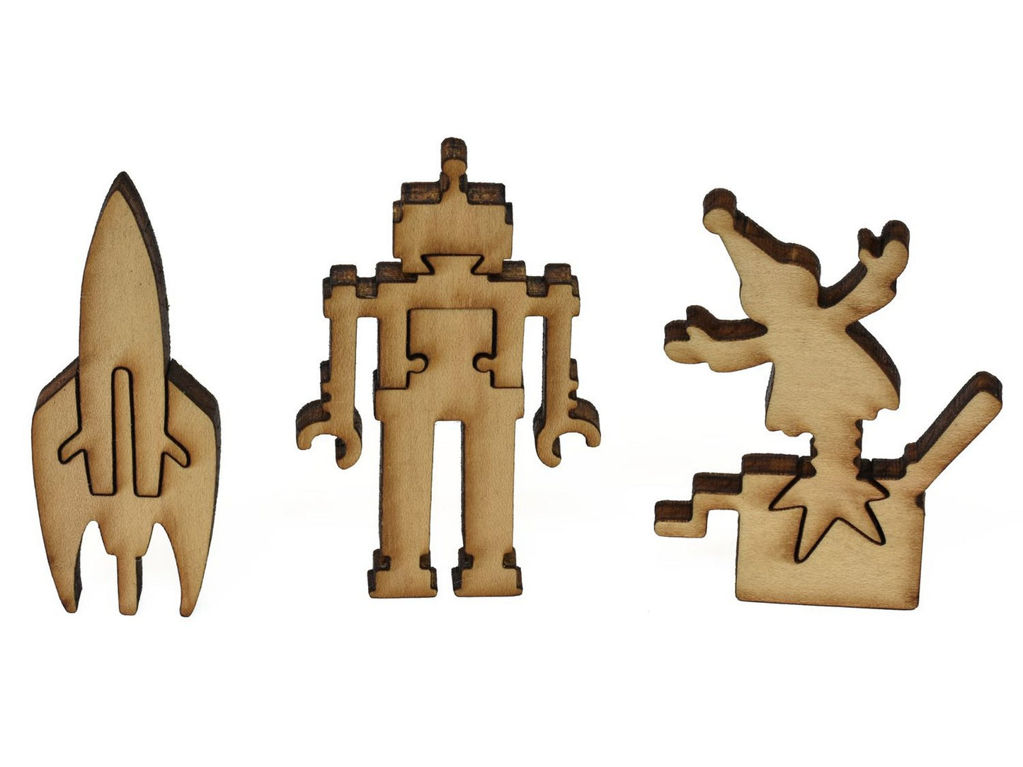 A closeup of pieces showing a jack in the box, rocket ship, and toy robot.