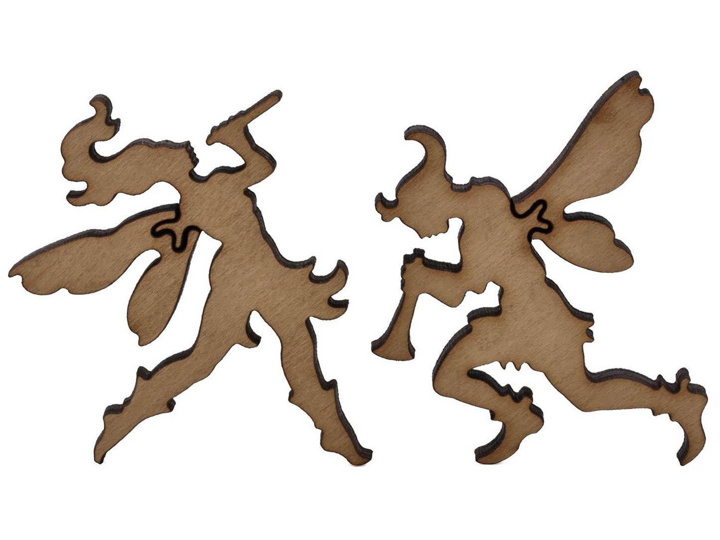 A closeup of pieces shaped like two large fairies playing horns.