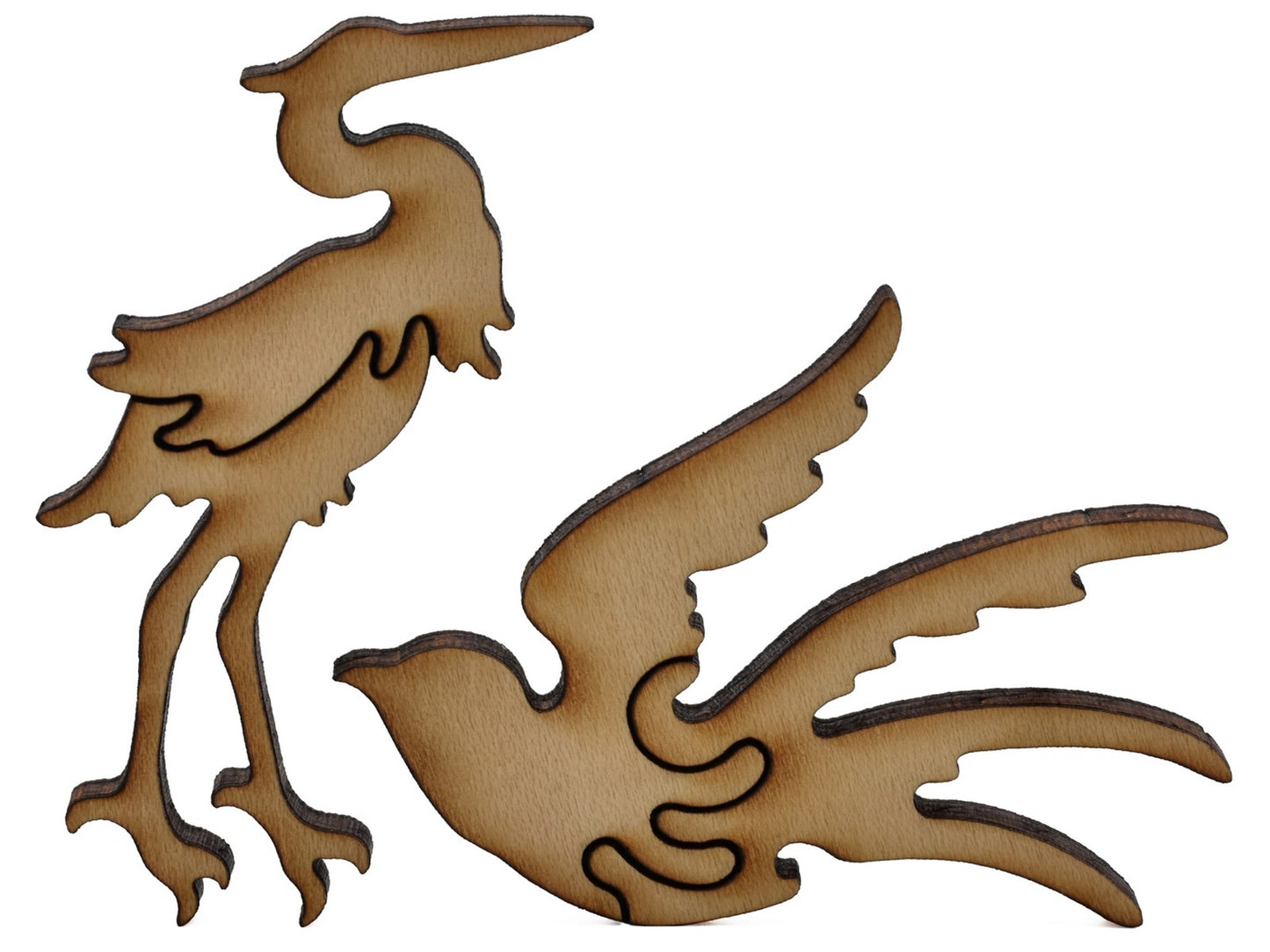 A closeup of pieces shaped like two birds.