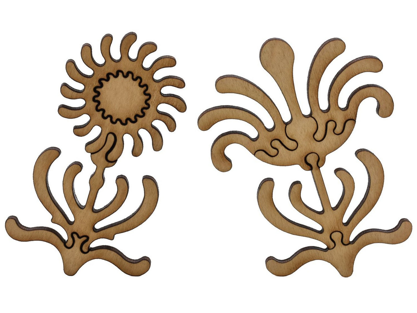 A closeup of pieces shaped like two large, multi-piece flowers.
