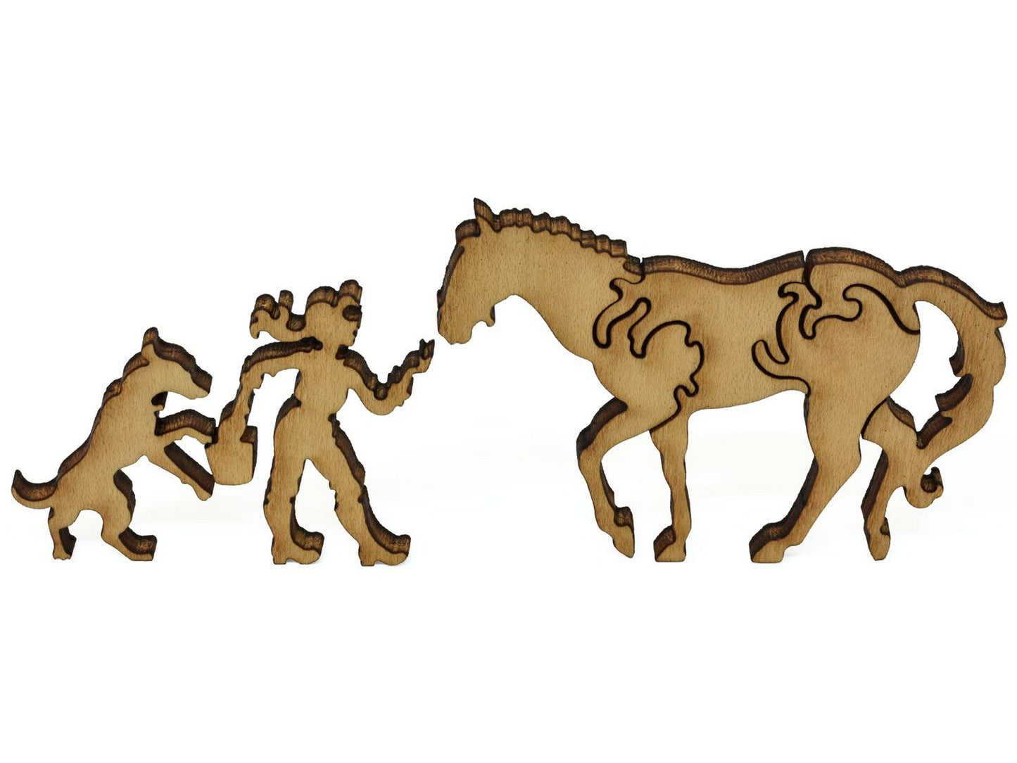 A closeup of pieces showing a woman feeding a horse.