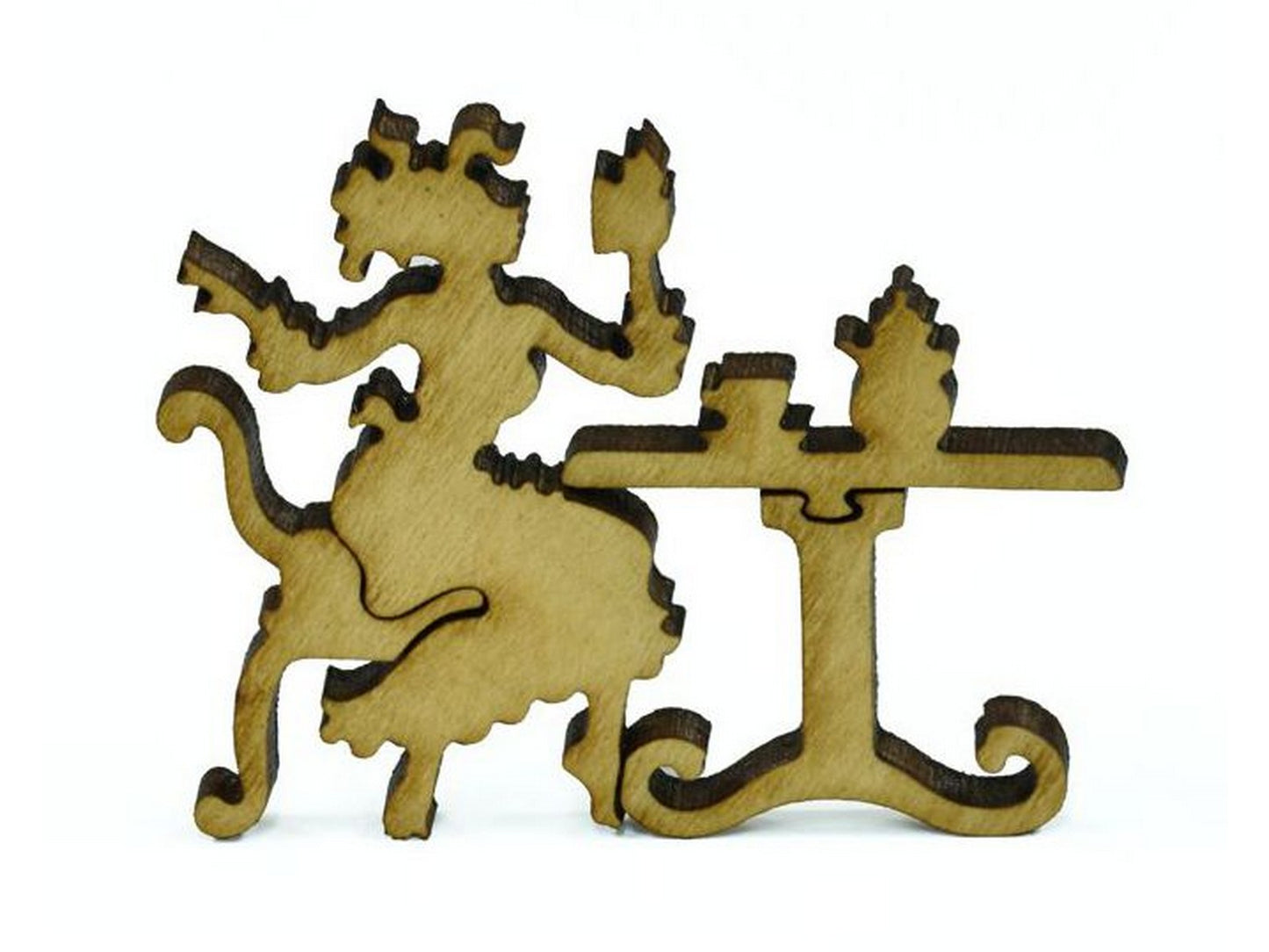 A closeup of pieces in the shape of a woman at a table.