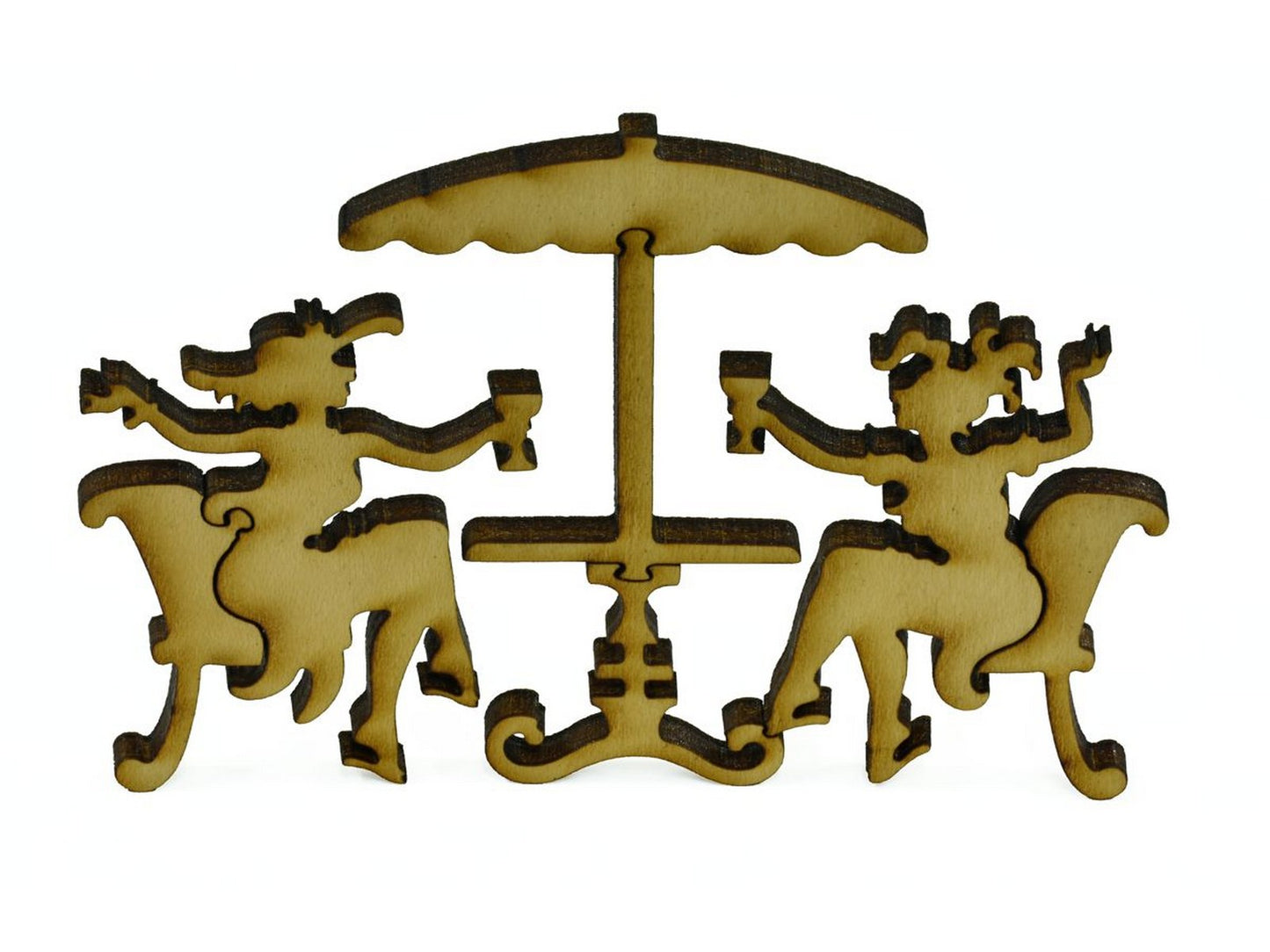 A closeup of pieces in the shape of two people sitting at a cafe table.
