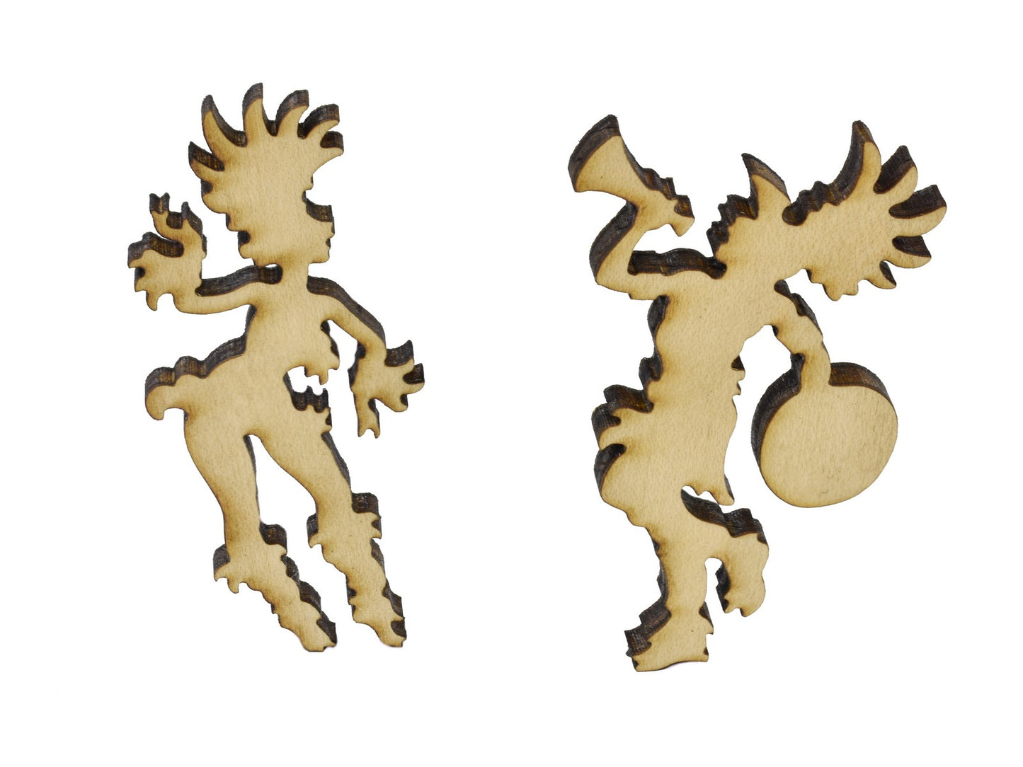 A closeup of pieces in the shape of two people dancing.