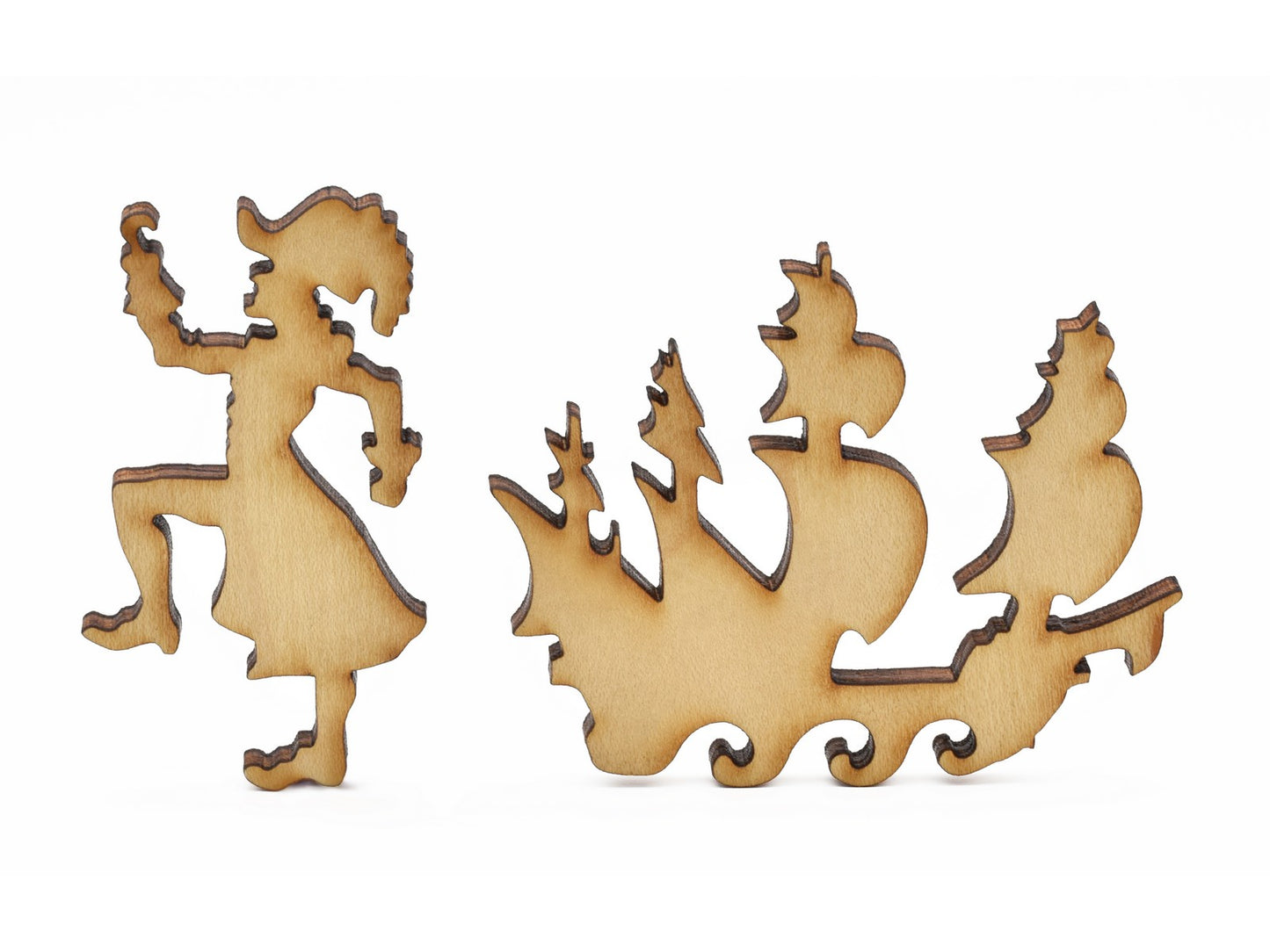 A closeup of pieces in the shape of captain hook and a ship.