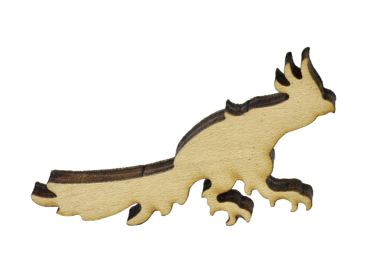A closeup of a piece in the shape of a parrot.
