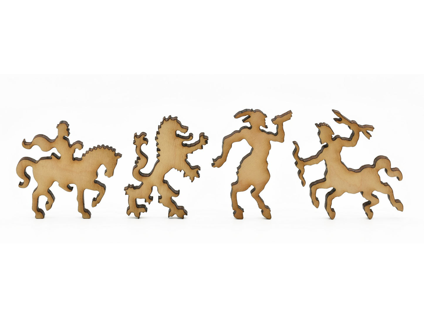 A closeup of pieces in the shape of a knight and mythical creatures.