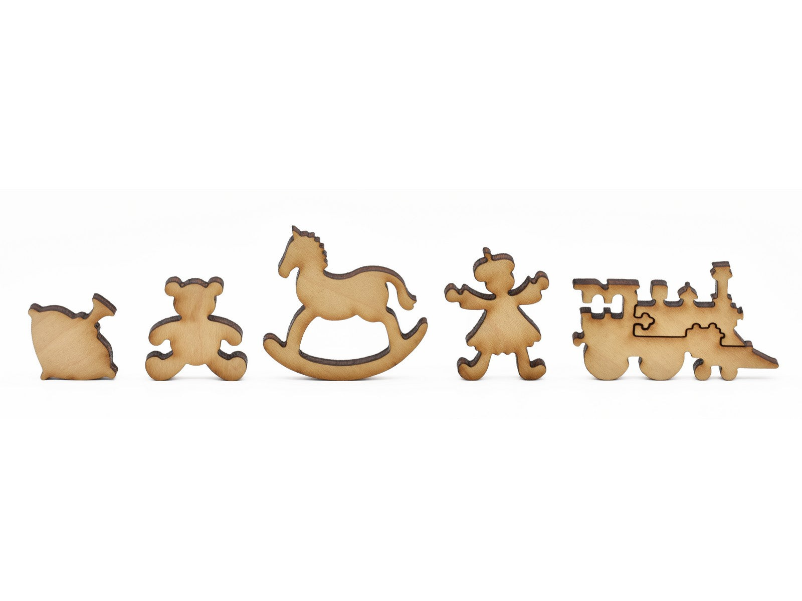 A closeup of pieces in the shape of toys.