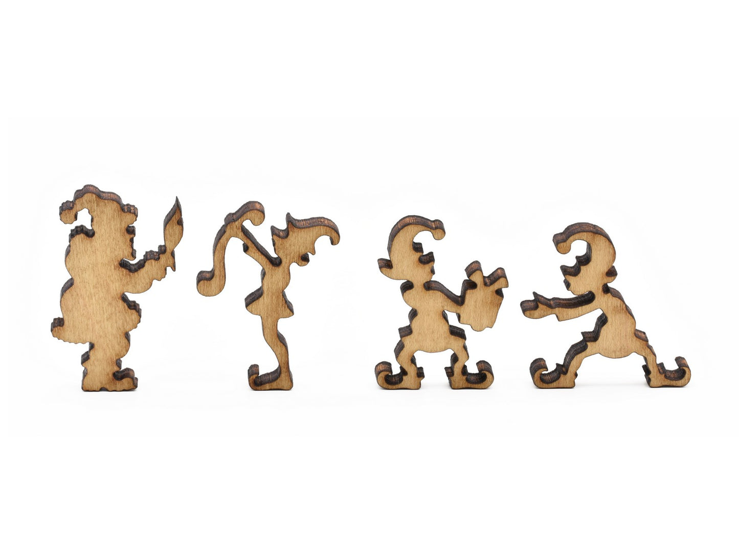 A closeup of pieces in the shape of santa and elves.