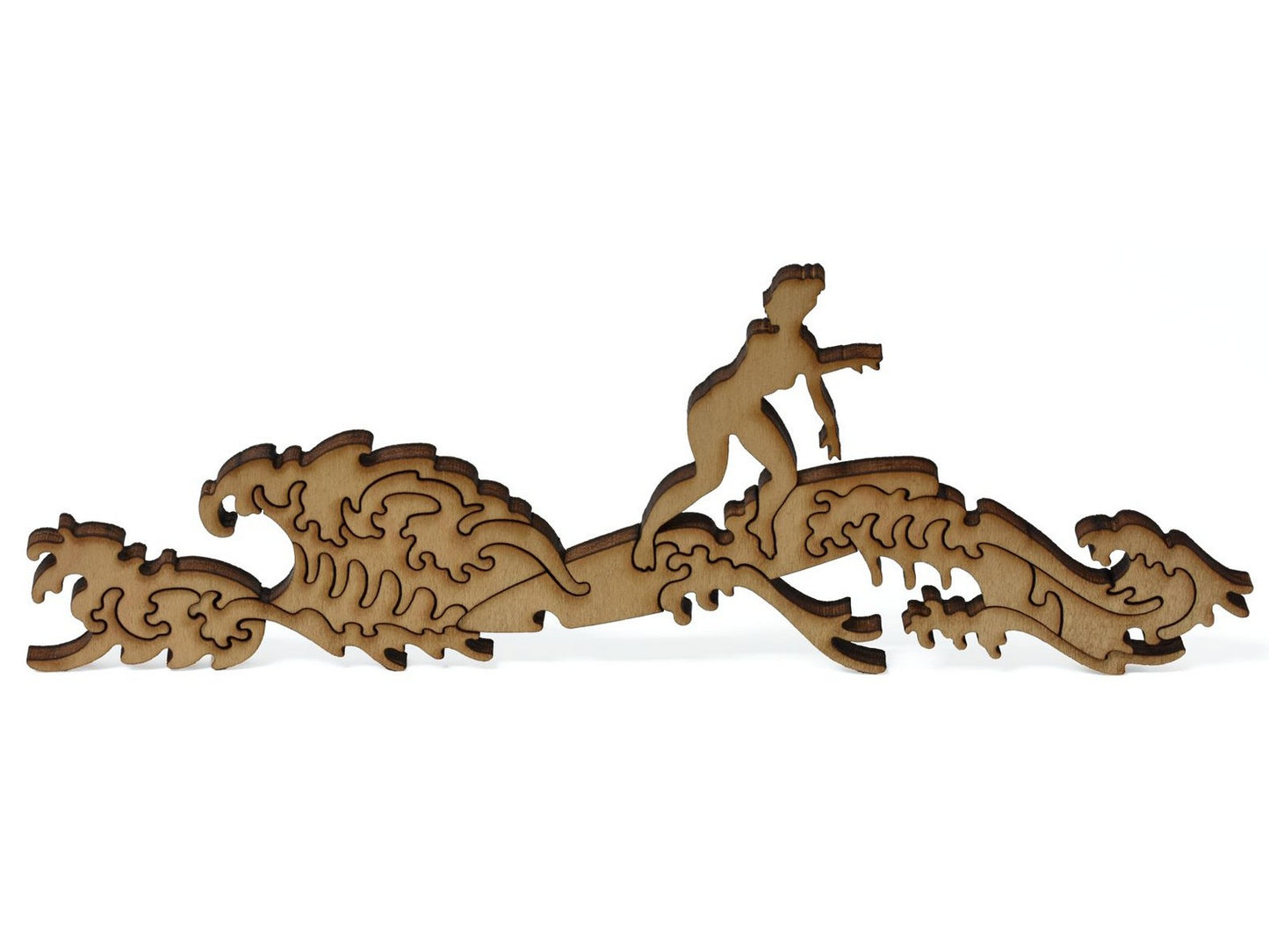 A closeup of pieces showing a woman surfing.