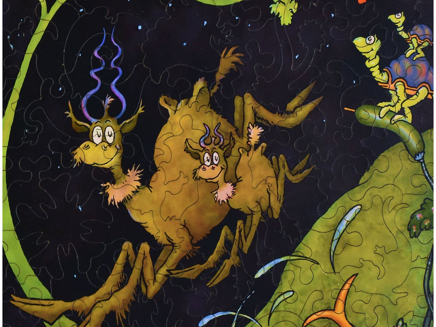 A closeup of the front of the puzzle, After Dark in the Park, showing the detail in the pieces.