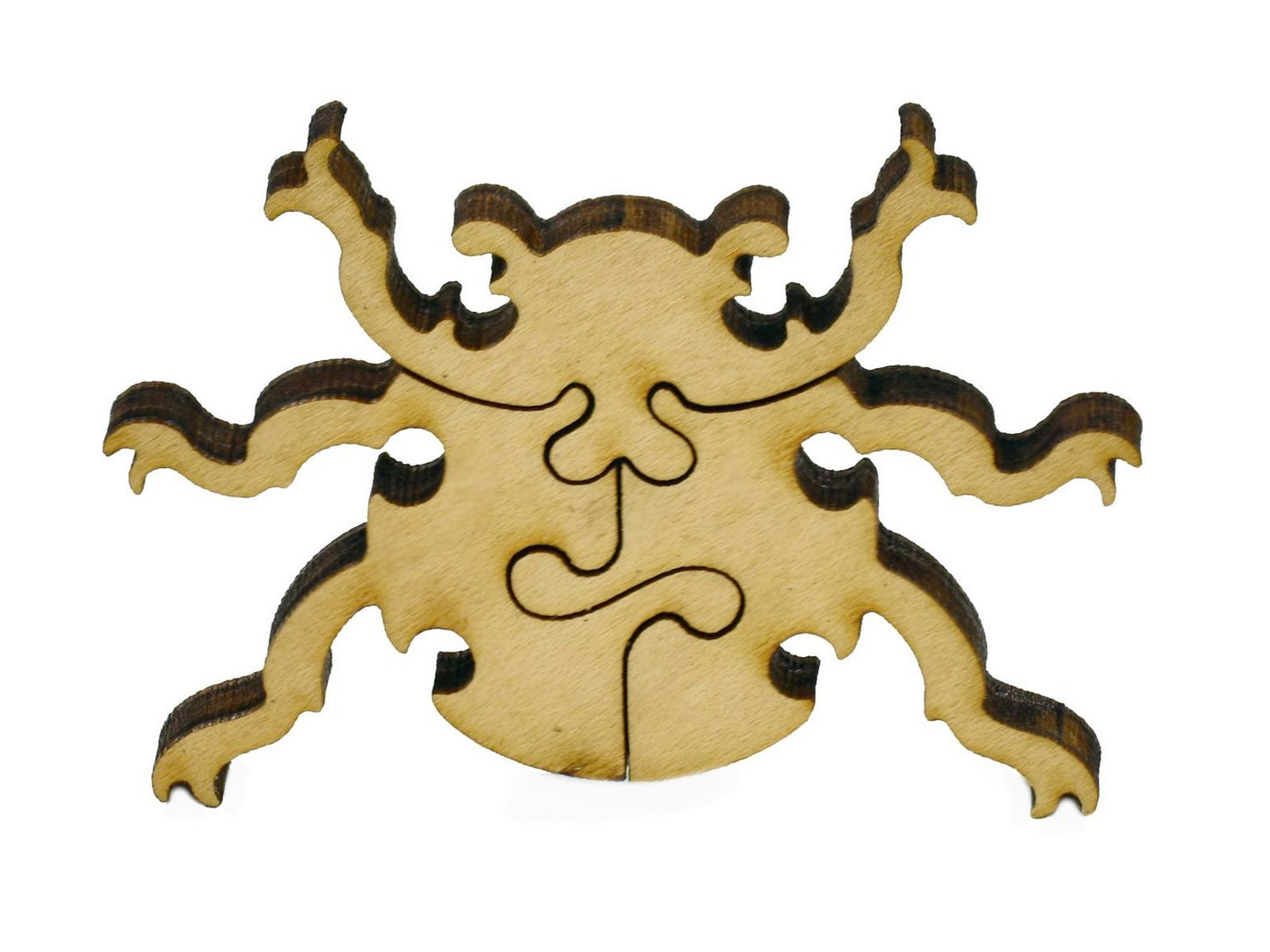 A closeup of pieces in the shape of a beetle.
